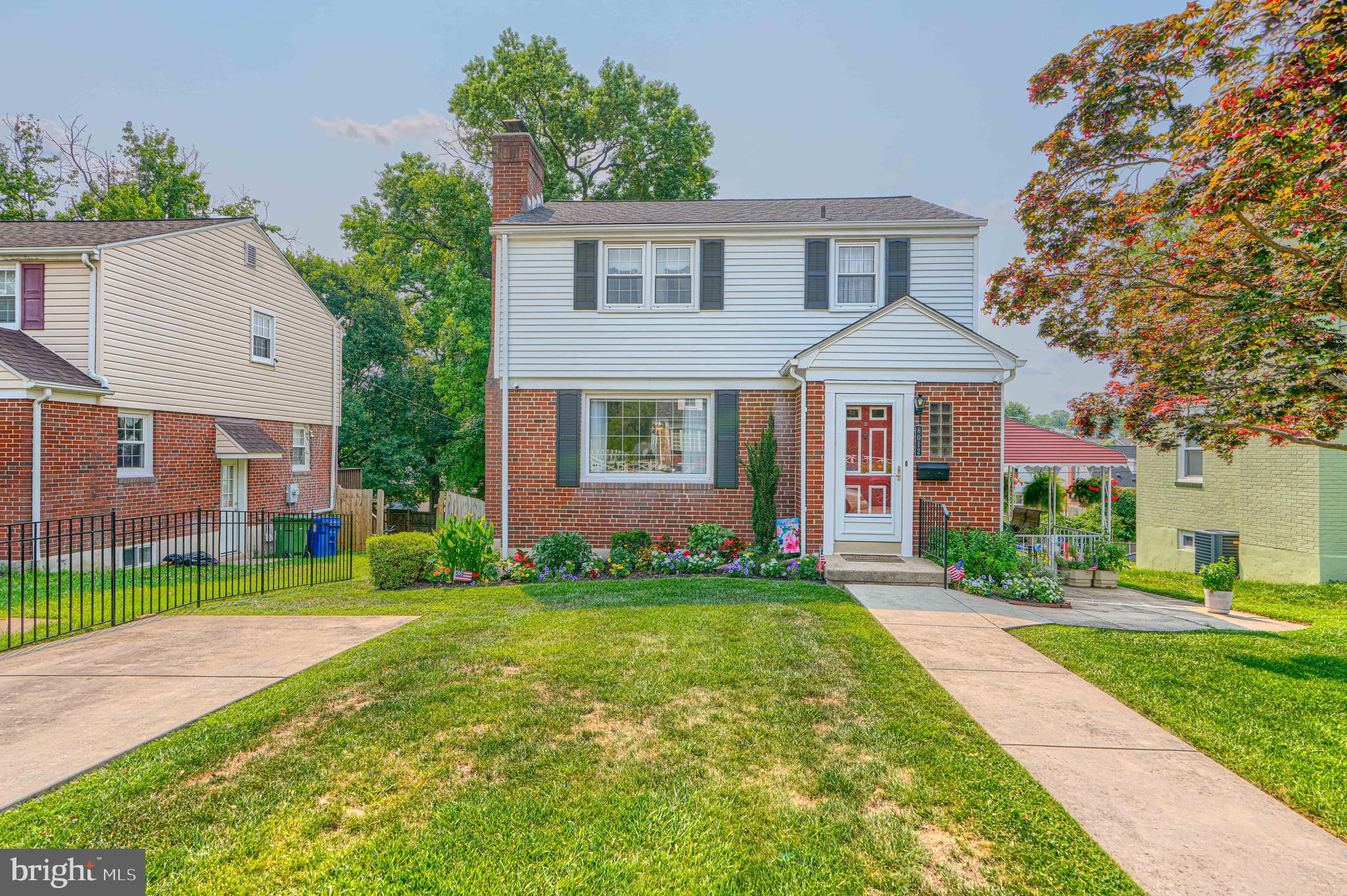 OPEN HOUSE Sunday, July 19th from 1:00-2:30pm!

Welcome Home to 6012 Winthrope Avenue, a charming 1956 two-story Colonial featuring 3
bedrooms, 1.5 baths, a finished basement, and timeless character throughout. This well-
maintained home offers a classic red brick exterior with vinyl siding on the upper level, off-street
parking, beautifully landscaped front and back yards, a covered side porch, and storage shed.

Step inside through the welcoming foyer with classic slate flooring and a convenient coat closet.
Rich, red oak hardwood floors extend throughout both the first and second floors, adding warmth
and elegance to every room. The living room is centered around a beautiful fireplace with
mantel, creating the perfect gathering place for family and friends. A separate dining room
provides an ideal setting for family meals and entertaining. The efficiently designed kitchen
features granite countertops, Pergo flooring, a gas range, under-cabinet range hood, refrigerator,
and dishwasher.

Upstairs are three comfortable bedrooms with closets and a full bath featuring timeless black-
and-white ceramic tile. The finished basement, with tongue-and-groove knotty pine paneling,
offers flexible space for a family room, recreation room, home office, club room, or personal
gym. The lower level also includes a half bath, laundry area with washer, dryer, utility sink, and
generous storage.

Major Improvements:
2025 – Hot water heater replaced
2019 – Gas furnace replaced; professionally maintained under a service contract since
installation
2017 – Roof replaced (transferable warranty good thru 5/8/2067)
2017 – Gutters replaced
2014 – Terra cotta portion of the sewer line replaced
2003 – Central air conditioning with Puron refrigerant and dedicated ductwork;
professionally maintained under a service contract since installation

Combining classic colonial charm, quality construction, and significant mechanical updates, this
move-in-ready home offers comfort, character, and exceptional value.