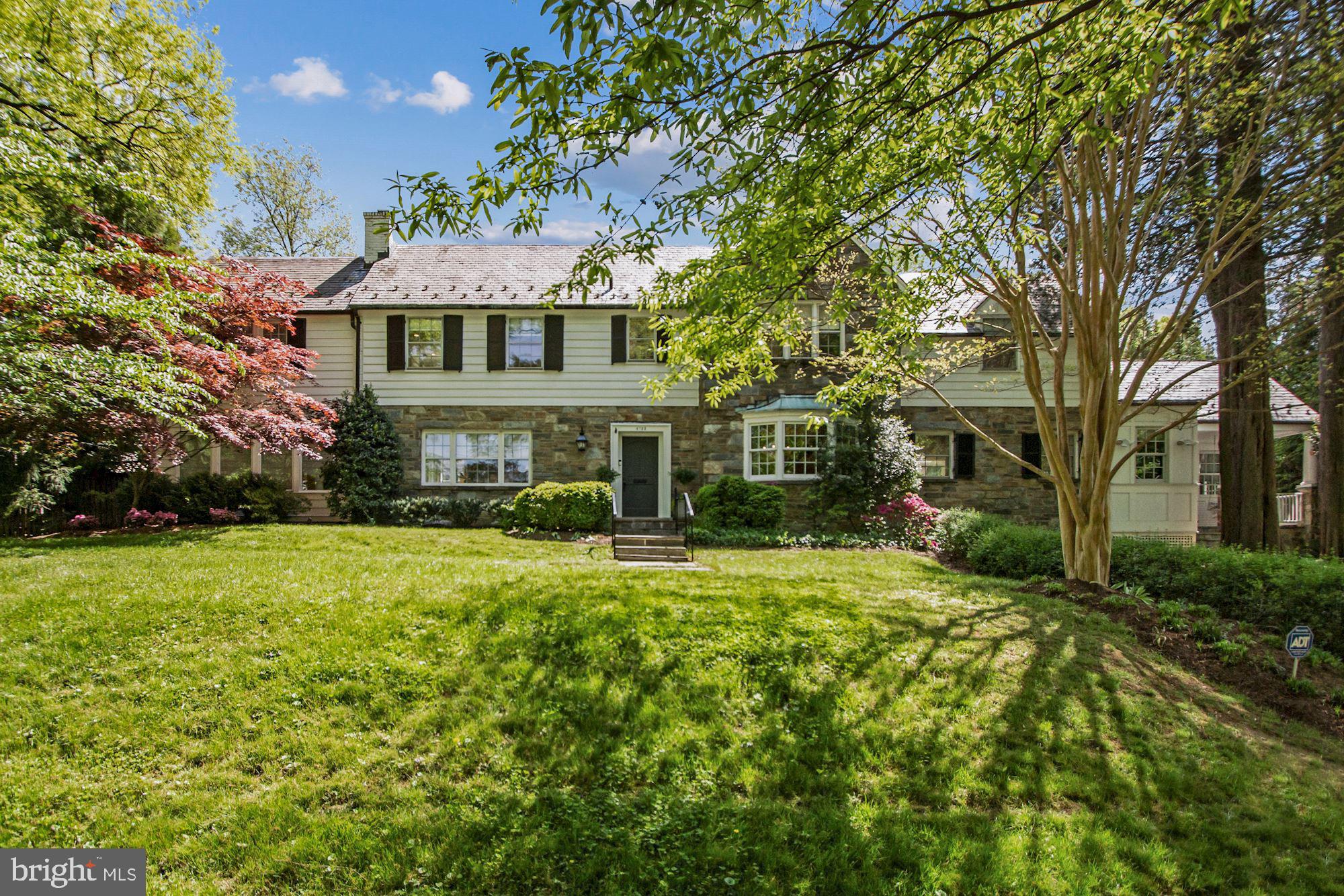 Stunning, light-filled home on large, 1/3 acre corner lot in Spring Valley! Family living at its best, this Marika Meyer-designed 5 bedroom/5.5 bath beautiful home features a lovely flow, with the spacious eat-in kitchen with attached great room serving as the heart of the home. The great room, with its vaulted ceiling and built-ins has French doors leading to the lovely deck and yard for easy indoor/outdoor entertaining.  In addition to the open kitchen/family room, the main level offers a Dining Room, Living Room, Home Office, Den, Powder Room and Mud Room accessed by the side porch entry.  Upstairs, there is a gracious primary suite with custom walk-in closet and marble primary bath.  There are 3 additional bedrooms with 3 full baths on the second level.  The basement offers a recreation room,  in-law suite and laundry.  The private, fenced in yard has mature landscaping and a lovely flagstone patio and deck for outdoor entertaining.  Located in the heart of one of the city's premiere neighborhoods, walkable to Millie's, Pizzeria Paradiso and Compass Coffee, plus the Spring Valley shops, this home is not to be missed!