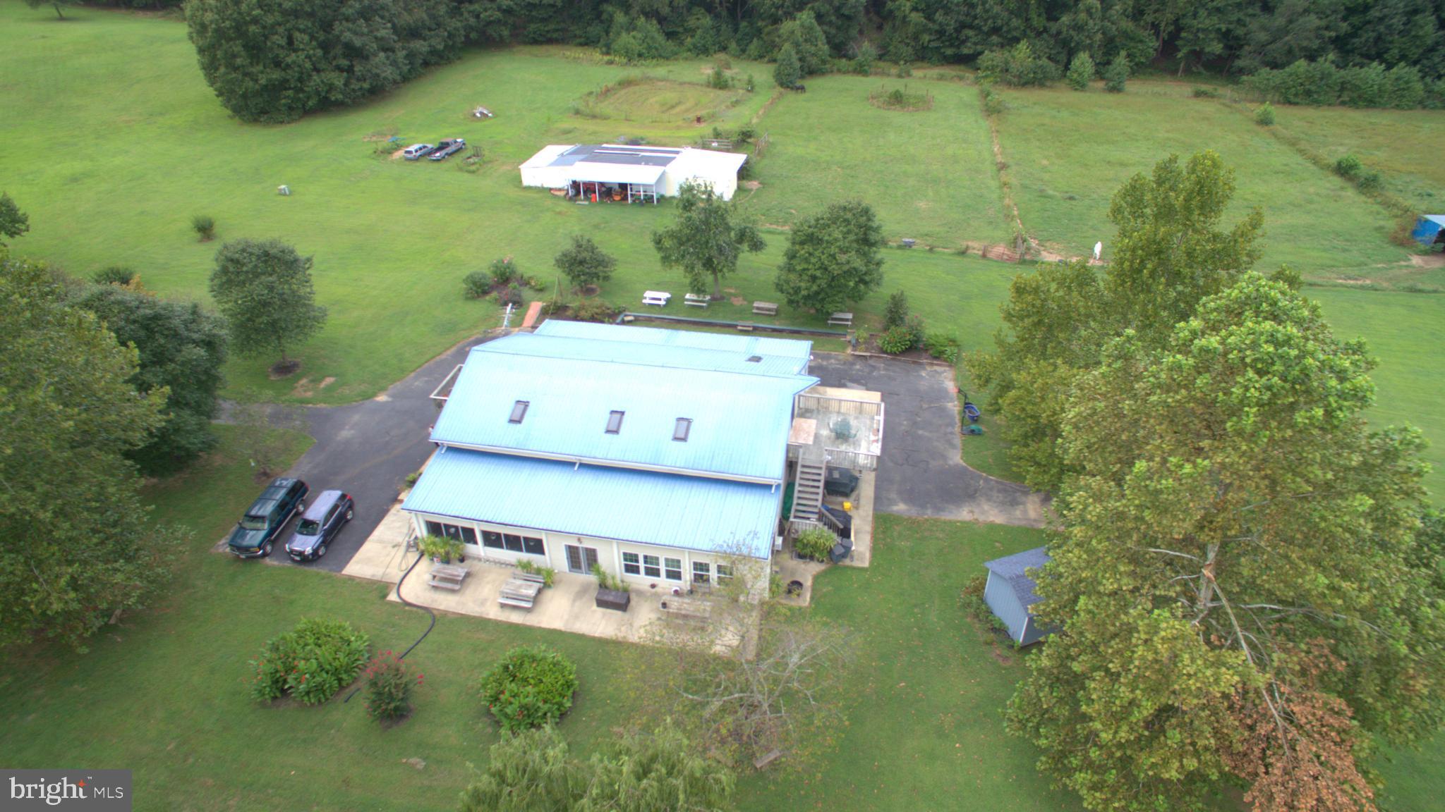 94 ACRE Horse Farm. 30 Acres of Fenced in land 8 Pastures. One Acre Pond with Bass, Blue Gill, Trout, and Catfish. Timber: Gum, Oak, Pine, Walnut, Maple, and Pulps. 4,270 Sq Ft Home with 5 Bedroom, 3 Full Bathrooms, 2 Full Kitchens, Large Screened in Porch. Metal Roof. Private Showings only call listing agent.