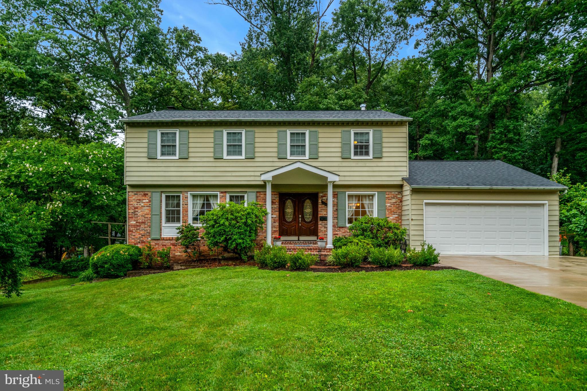 Welcome to 8304 Five Gates Road, a masterfully renovated sanctuary offering unparalleled quality, modern luxury, and multi-generational versatility. Perfectly situated on a quiet cul-de-sac and backing to a serene canopy of mature trees, this all-brick and siding home combines the peace of nature with an unbeatable Annandale location. ** Step inside to experience a true turnkey masterpiece. Brand-new solid hardwood flooring (2026) and a fresh, modern paint palette (2026) flow seamlessly throughout the main level. The gourmet kitchen is a chef’s dream, featuring premium granite countertops, 42-inch custom cabinetry, a massive center island with pendant lighting, a professional range hood, and sleek stainless-steel appliances (including a new refrigerator, dishwasher, and hood from 2025).  ** The upper-level owner's suite serves as a private retreat, complete with a spacious walk-in closet and a spa-like master bath outfitted with a large soaking tub and a separate shower. ** The fully finished, walk-out lower level offers incredible flexibility as an expansive in-law suite or a future income-generating rental. It features its own full second kitchen, a cozy gas fireplace, a cedar closet, and durable ceramic tile flooring. Walk straight out to the premium patio (2022) or entertain guests on the magnificent, brand-new deck (2026) overlooking your lushly landscaped backyard, complete with an ornamental garden bridge. ** Uncompromised Peace of Mind: This home boasts top-tier mechanical and structural integrity, courtesy of a business-owner's meticulous care. Major updates include a new roof (2021), driveway and patio (2022), and water heater (2023). The house went through an update in 2005 for windows, doors, plumbing, cabinetry, and electrical updates. ** Location, Location, Location: Woodson High School pyramid. Minutes from Lake Accotink, Audrey Moore Rec Center, and endless parkland. Enjoy being a mile to Northern Virginia Community College (NOVA) and less than 2 miles from vibrant local shops, dining, and major commuter routes. Visit soon!