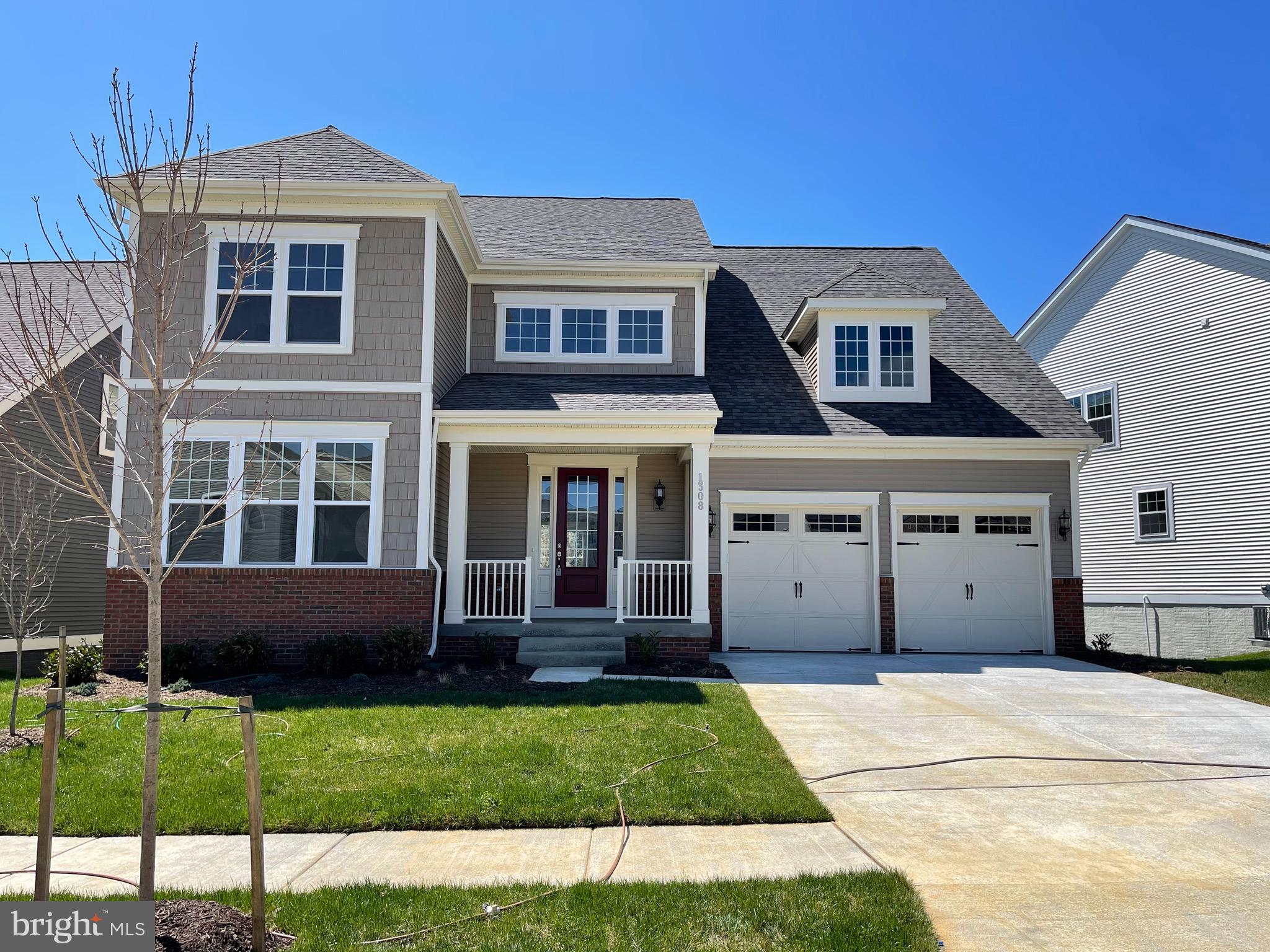 This beautiful and spacious Middleton Model by Stanley Martin is brand new. Huge 3 fully finished levels. Finished walkout basement has a wet bar, bedroom and bathroom. Main level has a bedrooms and full bathroom, plus rear sunroom, massive kitchen and family room with fireplace. Upper level has 4 bedrooms, luxury master bathroom with glass shower, 2 separate walk in closets and loads of windows to let in the natural light. All bedrooms have walk in closets. Amenities include trails, gym, dog parks, swimming pools, close to soccer fields and Publix and cafe.