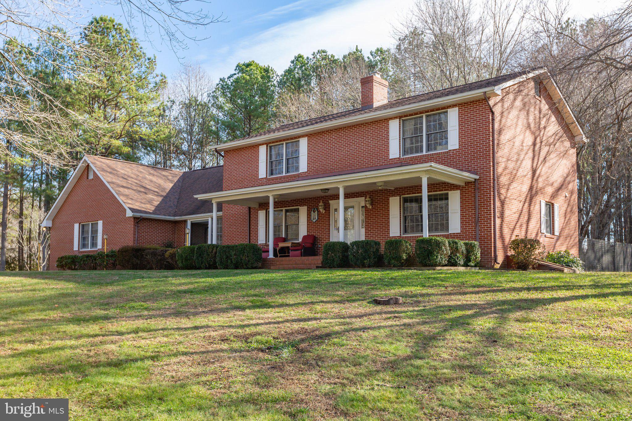 What a great opportunity to own this beautiful home sitting on a total of 17.71 acres including 2 additional lots. Not far from Lake Anna. This home was custom built for the owner who loved his horses on this horse farm. There is a huge barn including water, electricity, 11 stables plus a run in shed and big shed. There are plenty of riding trails through the area. There is a dog runner as well on the property. The property close to the house is fenced in as well. As you walk in through the huge 2 car garage, there is storage space and a door that  goes into the mud/laundry room/hall bath area. You will find a four season sun room off the back  of the house with great view of the property and steps out to the deck. The kitchen is huge for large family gatherings and plenty of space for family dinner or guest.  Enter the spacious family room/living room with a wood burning fireplace. Check out the half bath on this level plus a primary bedroom and  full bathroom suite that was recently remodeled. Lots of closet space too. Upstairs, you will find 3 bedrooms plus a bonus room off one of the bedrooms and a sitting area  with a balcony overlooking the the pasture and the trees. This home has fantastic potential; it needs some updating but what a wonderful home. Do not forget the brick front porch where you can enjoy your morning coffee or wine while watching the horses or farm animals.
This house is sold  “as is”.  Buyers certainly can do a void only home inspection and a well and septic inspection.