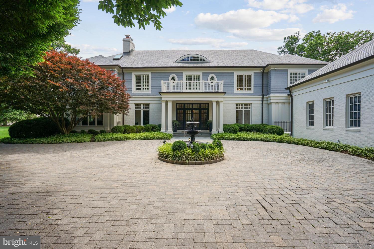 Introducing 10706 Riverwood Drive, a luxurious retreat in Potomac offering an unparalleled blend of space, comfort, and elegance. This magnificent property boasts 5 bedrooms, 5 full baths, and 3 half baths, spanning almost 12,000 sq ft of opulent living space on a sprawling 2-acre secluded lot.

As you step inside, you'll be greeted by the grandeur of floor-to-ceiling windows that bathe the home in natural light, creating a seamless indoor-outdoor connection. The interior is adorned with exquisite design details, including stunning moldings, hardwood flooring, elegant light fixtures, and lofty ceilings, creating an ambiance of sophistication and luxury.

The main level is an entertainer's dream, featuring a chef's kitchen equipped with top-of-the-line appliances, a spacious dining room, a butler's pantry, a formal living room, a casual family room, and an office adorned with wood paneling. Additionally, a thoughtfully designed mudroom with custom cabinets adds a touch of practicality to the space.

The owner's suite exudes luxury, boasting an arched ceiling, a cozy fireplace, and an adjacent sitting room with a wet bar. The suite also offers two walk-in closets that lead to a completely renovated spa bath, featuring custom cabinets, a soaking tub, a walk-in glass shower, and a double vanity. The upper level further hosts three additional bedrooms, each with its own ensuite bath, ensuring comfort and privacy for all residents.

The lower level is a haven for relaxation and entertainment, with a fitness room complete with an updated steam shower and sauna, a theater, a game room, and a family room featuring a custom-built bar and wine storage. An additional fifth bedroom and full bath on this level provide ample space for guests to enjoy privacy.

Stepping outside, you'll discover a resort-like oasis, complete with a beautiful pool surrounded by a new flagstone hardscape, lush landscaping, a built-in fire pit, and a sport court, offering the perfect setting for outdoor gatherings and recreation. 

This home also offers the convenience of a 3-car garage equipped with an electric car charger and a lift. This thoughtful addition provides both practicality and modern amenities, catering to the needs of car enthusiasts and those with electric vehicles.

Despite the secluded ambiance, this exceptional property is conveniently located just a five-minute drive from Potomac Village, offering easy access to local shopping, dining, and other amenities. Commuting is also a breeze, with major commuter routes such as River Road, Falls Road, Clara Barton Parkway, and 495 within easy reach.

Experience the epitome of luxury living at 10706 Riverwood Drive, where every detail has been meticulously crafted to provide a truly exceptional living experience.
