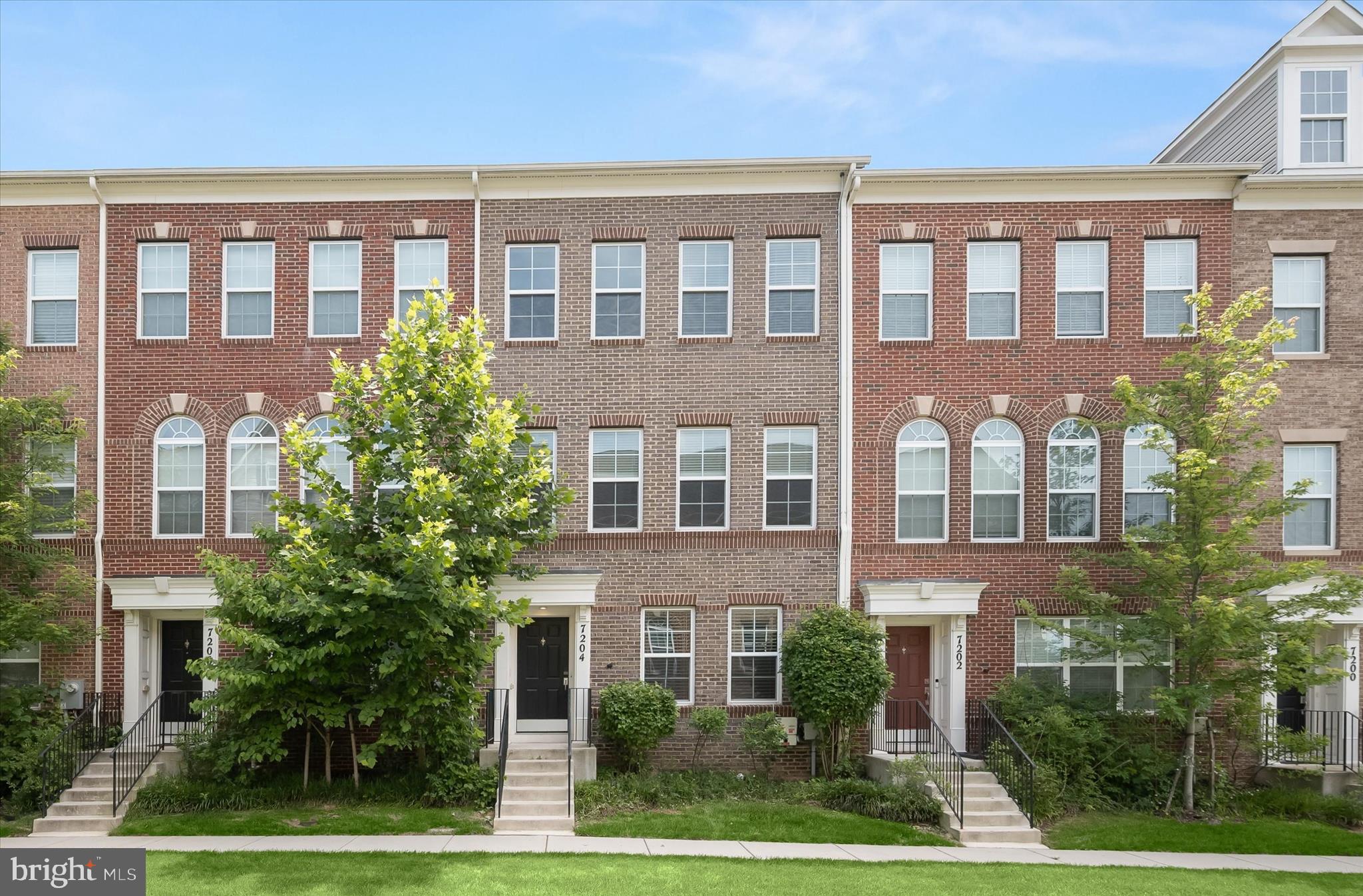 Experience modern comfort and a prime location in this immaculate three-level townhome in the sought-after Brickyard Station community.
Hardwood flooring extends throughout all three levels, complemented by upgraded lighting fixtures and ceiling fans that add a polished touch throughout the home. The entry level welcomes you with a spacious foyer and a versatile family room that easily functions as a home office, exercise space, hobby room, or additional living area. A convenient powder room and direct access to the garage enhance everyday functionality. The rear-loading two-car garage has been thoughtfully finished with custom-painted walls, epoxy flooring, and an electric vehicle charging station.
Designed for both entertaining and daily living, the bright and open main level centers around a stunning kitchen featuring granite countertops, upgraded appliances, a Samsung smart refrigerator with video and WiFi capabilities, abundant cabinetry, and an oversized center island with seating for six or more. The living room is warmed by a gas fireplace and accented by custom built-ins, while the dining area offers direct access to the deck, creating a seamless indoor-outdoor flow. Solar panels add long-term energy savings and efficiency to the home.
Upstairs, the spacious primary suite serves as a private retreat, complete with a custom walk-in closet featuring built-in organizers and an elegant en suite bath with a double sink vanity, tiled shower with frameless glass door, and private water closet. Two additional bedrooms share a full bath, while a conveniently located laundry room is equipped with WiFi-enabled washer and dryer.
Residents of Brickyard Station enjoy an outstanding collection of community amenities, including a clubhouse, fitness center, swimming pool, playgrounds, walking trails, green spaces, and gathering areas. The location offers exceptional convenience with easy access to I-95, Route 1, and the ICC, while the nearby MARC train station and public transportation options provide an easy commute to Washington, D.C., Baltimore, and surrounding employment centers. Shopping, dining, entertainment, and everyday conveniences are all just minutes from home.