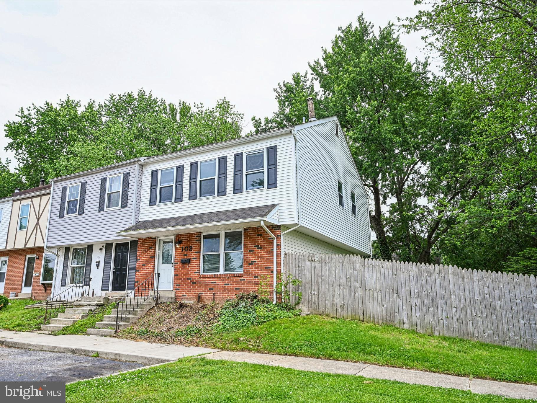 Welcome to 102 Hopkins Ct. in Newark Delaware! Located in the community of Whispering Pines. Location could not be better with many major highways including I-95 and 896 within a few minute drive. Or maybe you are looking to be close to the University of Delaware. Either way you will be happy to call this home! Once entering this corner unit you are greeted with beautiful hard wood floors through even including the three upstairs bedrooms. Completed with one full and one half bathroom there is more than enough room for the whole family. The kitchen has beautiful granite counter tops and  easy access to the dining room. Also enough space for its own table or other furnishments. Moving out the sliding glass doors in the extra large fenced in yard you will notice this is one of the largest lots in the neighbor for a townhome. Laundry area and ample storage are available in the full sized basement. Book your tour today!