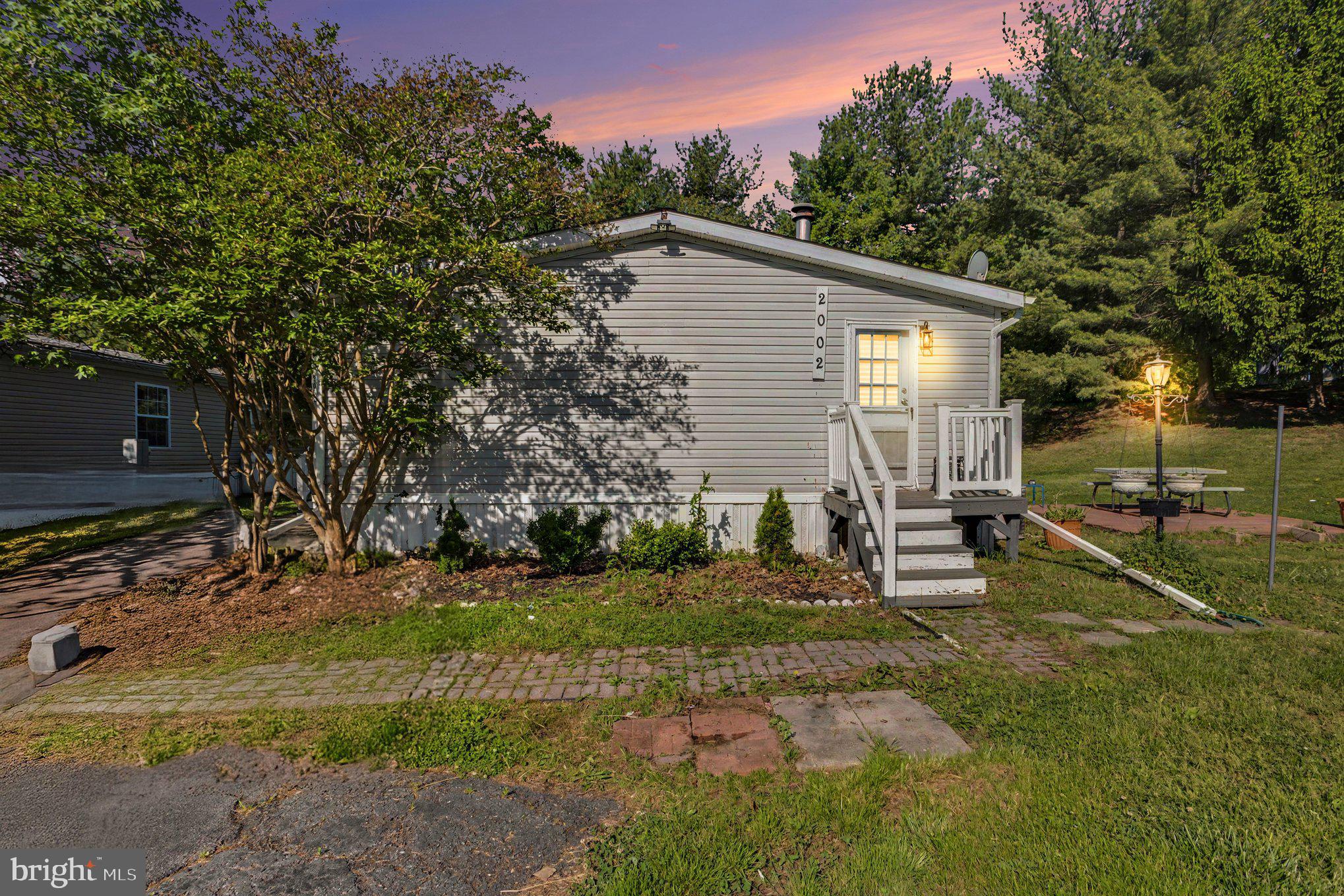 Private Wooded Setting in Harford Mobile Village

Tucked toward the back of the community and backing to mature trees, this 3-bedroom, 2-bath manufactured home offers a more private setting than many homes in the neighborhood. With vaulted ceilings, an open feel, driveway parking, and a peaceful wooded backdrop, this home is a great opportunity for buyers looking for comfort, convenience, and affordability in Edgewood.

Step inside to a bright, functional layout with vaulted ceilings that help the main living areas feel open and inviting. The floor plan offers comfortable everyday living, with space to relax, gather, and make the home your own.

The home features three bedrooms and two full bathrooms, giving buyers flexibility for sleeping space, guests, a home office, or additional storage. Whether you are purchasing your first home, downsizing, or looking for a more affordable path to ownership, this property offers practical space in a convenient Harford County location.

One of the standout features is the setting. Nestled toward the rear of the community, this home backs to trees and woods, offering added privacy and a more peaceful feel than being positioned in the middle of the park. Enjoy the mature tree backdrop, a driveway for off-street parking, and the benefit of being located within the Harford County Public Schools district.

Financing is often one of the biggest questions with manufactured homes, and buyers should know there may be multiple financing paths available. Options may include specialized manufactured-home lenders such as 21st Mortgage, APGFCU, or other qualified lenders familiar with this type of property. Low-down-payment options may be available for qualified buyers, making this a home worth exploring if you have been looking for an affordable ownership opportunity.

Conveniently located in Edgewood, this home offers access to major routes, shopping, dining, schools, and everyday amenities while still providing a quieter position within the community.

Affordable, practical, and set against a wooded backdrop—2002 David Dr is ready for its next owner. Schedule your private tour today and ask about available manufactured-home financing options.

Pets are allowed in the community, there is a 30lbs weight limit. All residents must complete an application to live in the community.