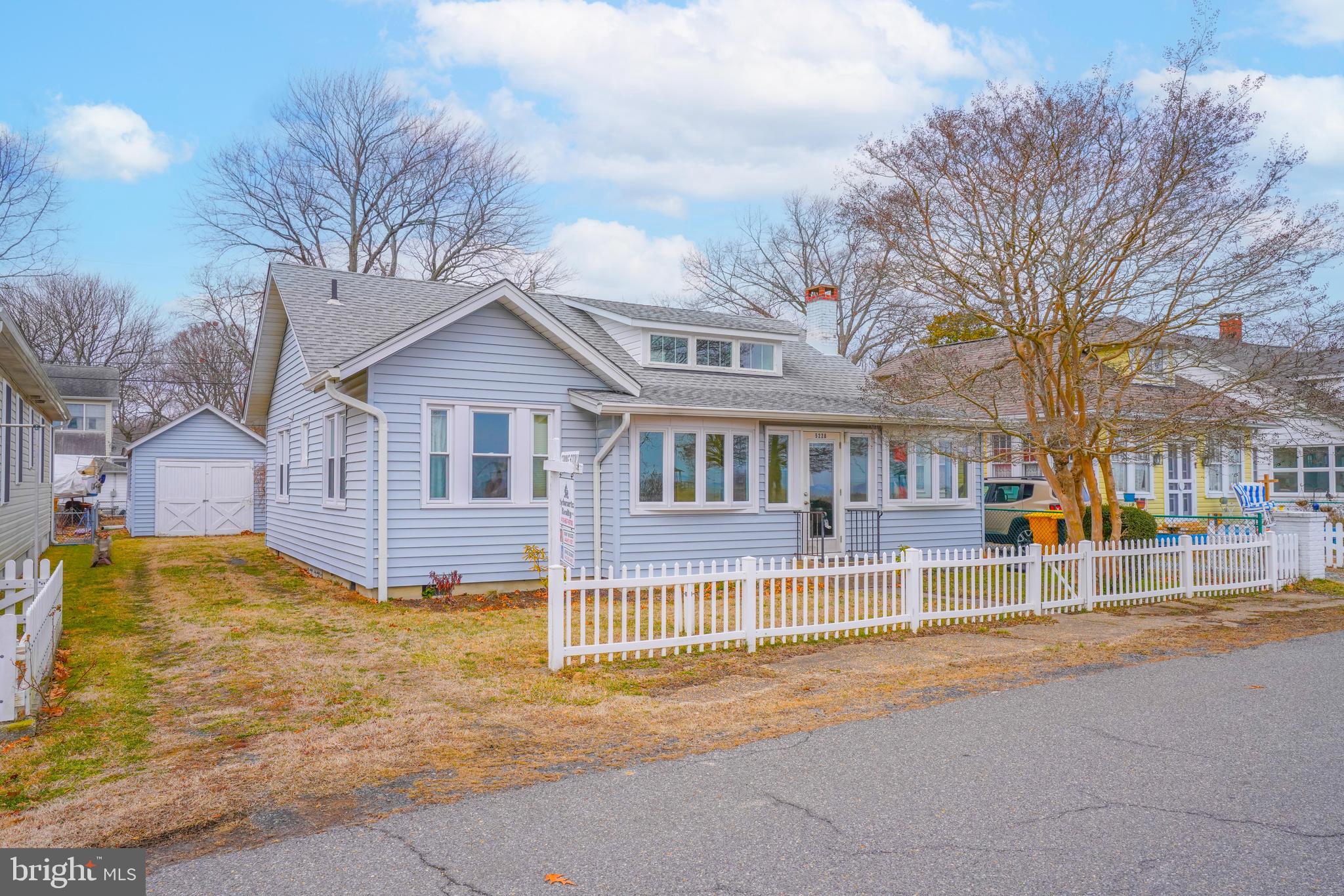 Charming Chesapeake Bay cottage with breathtaking water views from nearly every room! Start your mornings with a stunning sunrise from the all-season front porch. This well-maintained home features beautiful hardwood floors, new windows (2013), fresh paint (2015), and a fully encapsulated crawl space (2022). A detached garage provides extra storage. Just steps from the community beach, marina, pier, boat ramp, playground, and more. This cherished family home, rarely available in such pristine condition with these incredible views, is a true gem. Don’t miss this opportunity!. Not in a flood zone. Most furniture can convey if needed. 100% financing available through USDA loan.