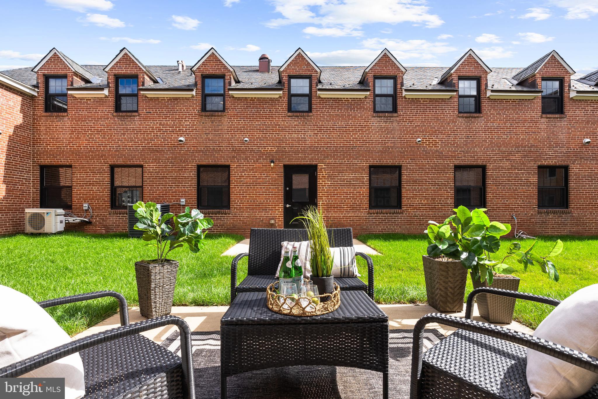 Welcome to the Quarters at Liberty, a collection of six  1-2 bedroom, two-level condominiums developed by The Alexander Company inside the historic residences of the former prison guards. With an industrial loft aesthetic, this spacious 2,080 SF home welcomes visitors into an open floor plan with a living room, dining area, and kitchen.  The generously proportioned kitchen offers a breakfast bar, gas range, stainless steel appliances, granite countertops, and plentiful storage.  Just off the kitchen, the bright family room is appointed with exposed brick walls. A powder room and coat closet complete the main level.  Just upstairs are a home office area, primary suite with a large walk-in closet, en-suite bathroom and laundry, and a second bedroom with walk-in closet and bathroom. Residents of the Quarters enjoy all the amenities of Liberty including the fitness room, yoga room, community center, outdoor pool, playground, and Liberty Green.  Residents of Liberty enjoy shopping at Lidl, dining at Taco Rock, Yafa Grille, Ledo Pizza, and Kokee Tea, as well as working out at F45 or Capital MMA.   Parents appreciate the convenience of the renown Brynmar Early Education and Preschool right there at Liberty.  The Quarters is conveniently located less than 1.5 miles from I-95, 5 miles from Occoquan, 9 miles from Fort Belvoir, 17 miles from the Pentagon, 20 miles from Reagan National Airport and Washington, DC.