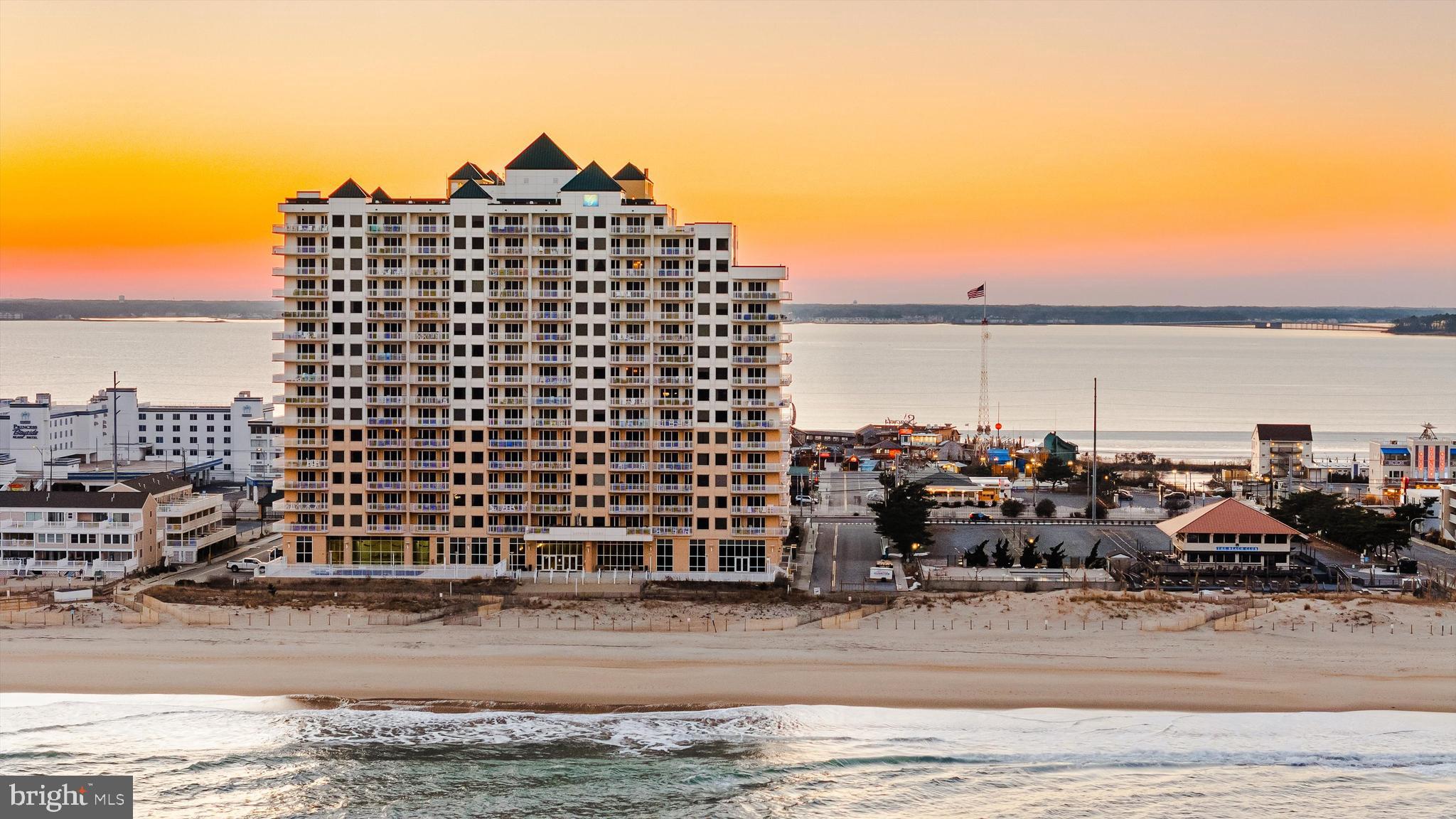 Penthouse-like living meets one of the most commanding vantage points in Ocean City. Positioned on the northeast corner of the 16th floor at the Gateway Grand, Residence 1612 offers a rare combination of elevation, scale, and unobstructed sight-lines stretching from the Atlantic Ocean to the Assawoman Bay, across North Ocean City, and toward the Route 90 bridge.   This may just be one of the most impressive residences in the entire building.   

This direct oceanfront end unit features a one-of-a-kind floorplan and is among the largest in the building, offering 2,000+ square feet with four bedrooms and four full baths. Countless windows and sliders capture sunrise over the ocean and sunset over the bay, with the living area, primary suite, and a guest bedroom all enjoying panoramic views that elevate the entire living experience.

The primary suite delivers captivating ocean and bay vistas and is complemented by an all marble bath with a walk in shower and soaking tub. The residences layout balances openness with privacy, ideal for hosting family and guests while maintaining a refined, comfortable flow throughout. This home is offered unfurnished, providing a blank canvas for a new owner to personalize without constraint.

The kitchen is equipped with gourmet appliances and designed to support both everyday living and entertaining, while remaining connected to the dramatic coastal backdrop with the views that define this home.

Gateway Grand is widely recognized as one of Ocean City’s premier luxury condominium buildings, offering an unparalleled ownership experience. Amenities include heated indoor and outdoor pools, a fitness center, gated parking garage, deeded storage lockers, owners lounge, grand lobby, on site building management, and security. The property conveys with three parking passes, a notable advantage for a four bedroom residence. Owners are permitted to have pets, while guests and renters are not.

The midtown location provides exceptional access to local dining, entertainment, and everyday conveniences, while remaining comfortably removed from downtown congestion. Proximity to the Route 90 bridge allows for seamless arrival and departure, and the Boardwalk is easily accessible without the intensity of a downtown address.

While this residence has never been rented and has been enjoyed as a primary home, the Gateway Grand has a long established history of demand for luxury rentals, offering future flexibility for a new owner. The home is offered as the seller relocates closer to family, presenting a rare opportunity to secure a one-of-a-kind oceanfront residence with scale, privacy, and views that are increasingly difficult to replicate.
*Property is owner occupied.   Please provide advanced notice for showings.