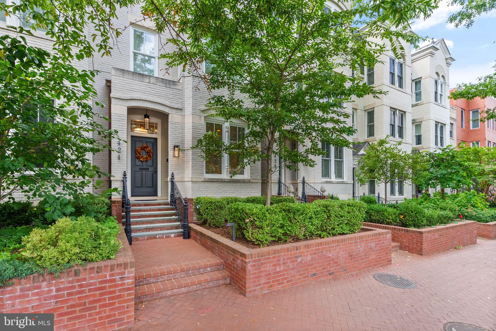 Experience the pinnacle of luxury and convenience in this stunning modern residence, featuring 4 bedrooms and 4.5 baths, located in the heart of Capitol Hill and just steps from Union Station. This home effortlessly combines modern elegance with thoughtful design, offering a spacious, light-filled layout perfect for both sophisticated living and entertaining. Upon entering, you're greeted by gleaming hardwood floors, custom millwork, and soaring ceilings that create an atmosphere of timeless refinement.

A dual-sided, see-through gas fireplace divides the living room and dining room, providing warmth and ambiance to both spaces. The dining room is further enhanced by an elegant wet bar, ideal for hosting and entertaining. The gourmet kitchen, featuring quartz countertops, top-of-the-line appliances, a Sub-Zero refrigerator, and a Sub-Zero wine fridge, is truly a chef's dream.

Each of the four bedrooms boasts its own luxurious en suite bathroom, offering ultimate privacy and comfort. Upstairs, the owner's suite provides a serene retreat, complete with heated floors in the spa-like en suite and a spacious walk-in closet.

Step outside to the private patio, an ideal space for outdoor dining and entertainment. Whether enjoying quiet evenings or lively gatherings, this outdoor oasis adds a touch of tranquility to city living.

An in-home elevator ensures seamless access to all levels, making this home perfect for busy professionals. Complete with a private, gated garage for secure parking—an invaluable feature in Capitol Hill—this residence offers everything the discerning buyer desires, with the added convenience of being just steps from dining and shopping.
