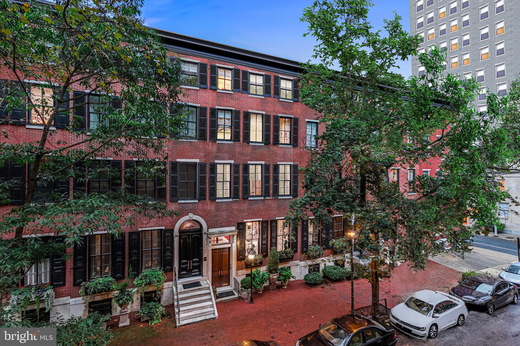 Simply spectacular at every turn, this one of a kind Delancey jewel is located in a quiet location on the most coveted residential block of historic Rittenhouse Square in Philadelphia. Rarely does such a stunning property become available, offering meticulously restored original architectural details and refinements from its initial construction in the 1860s, with seamlessly integrated modern designs, renovations, updates and endless thoughtful amenities. Breathtaking features include soaring ceilings with light- filled floor- to -ceiling windows, elegant neutral decor, beautifully restored millwork and moldings, 8 fireplaces with ornamental mantles, plaster details, gleaming hardwood floors and gracious room sizes throughout with an easy and sensible flow for today's every day and entertaining lifestyles. The living spaces include a beautiful sun-filled  front to back center foyer, dramatic living and dining rooms with gas fireplaces, gourmet kitchen with Sub-Zero and Dacor appliances, breakfast room with a wall of windows and fireplace on the street level, spacious paneled family room with original restored leaded glass windows and gas fireplace, laundry room , powder room and luxurious primary suite with renovated marble bathroom and walk-in closets on the second floor, richly paneled family room/office with gas fireplace and built-ins, second and third bedrooms each with renovated en-suite baths on the third floor and  fourth and fifth bedrooms with a full renovated hall bathroom and expansive scenic terrace on the fourth floor . The entire residence is accessible from the grand sweeping central staircase or with the 5-stop elevator, which runs from the attached oversized garage/ mudroom spaces up to the 5th level. Move right in and enjoy the endless improvements made by the most recent stewards of this iconic property, just steps away from world class cultural destinations, renowned restaurants, unparalleled educational institutions, historical sites, recreational opportunities, trains, Philadelphia International Airport and more.