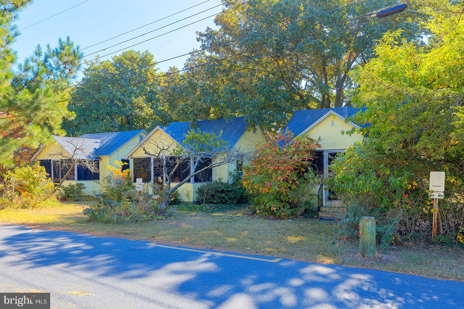 FEE SIMPLE double lot in the heart of Dewey Beach, offering exceptional potential with 3 charming cottages, perfectly situated on the Bay side. This prime location is just steps away from all that Dewey has to offer, including miles of pristine beach, boating opportunities, the beloved Funland amusement park, live music, and more – all just around the corner or a quick Jolly Trolley ride away. Located at the corner of Houston & Bayard, this property is ripe for redevelopment and presents endless possibilities to create your dream project. Whether you're looking to preserve the current cottages or build something new, the canvas is yours to design. Embrace the Dewey Beach lifestyle with this rare opportunity to own a slice of paradise in one of Delaware's most sought-after beach communities. The potential here is limitless!