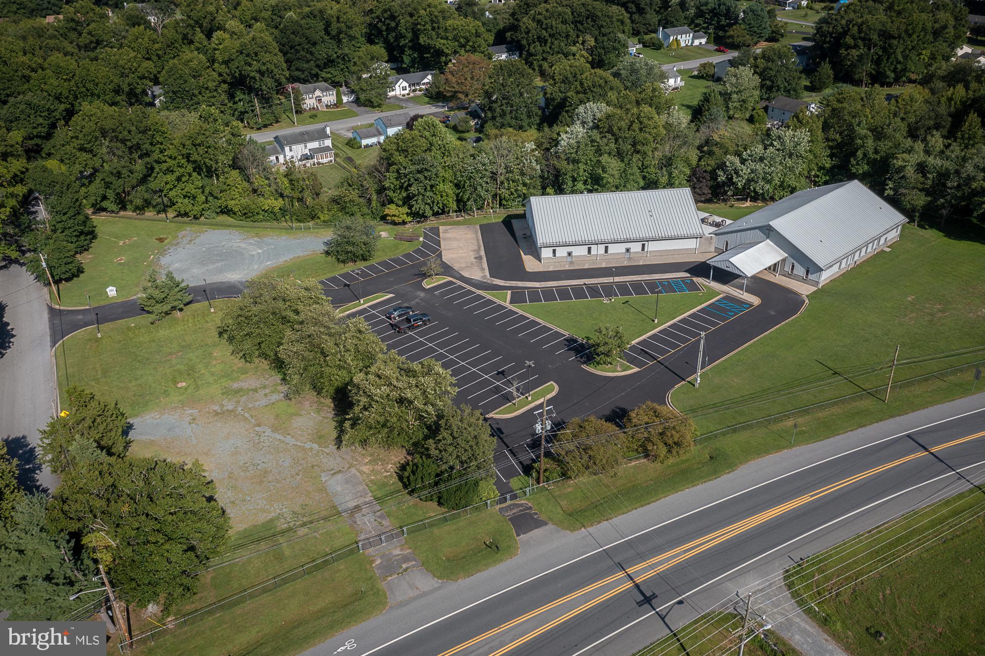 This 14,360-square-foot free-standing church facility offers versatility and convenience, situated just off a main highway with easy access to the interstate and surrounding populations. With a spacious sanctuary seating up to 600+, complete with a balcony, this property is ideal for large gatherings, worship services, and community events. The open metal structure simplifies any renovations, allowing easy customization to meet your needs.

The facility includes a fully-equipped commercial kitchen and a large dining area, perfect for hosting meals or receptions. Multiple auxiliary rooms provide flexible spaces for meetings, classes, or offices. Ample primary restrooms with multiple stalls, along with two additional single-stall bathrooms, ensure comfort for large crowds.

The sale includes three parcels, with the church building on one and the other two previously used as home sites. With its convenient layout, adaptable design, and prime location, this church facility is ready to meet the needs of growing congregations, community organizations, or those seeking a unique venue.