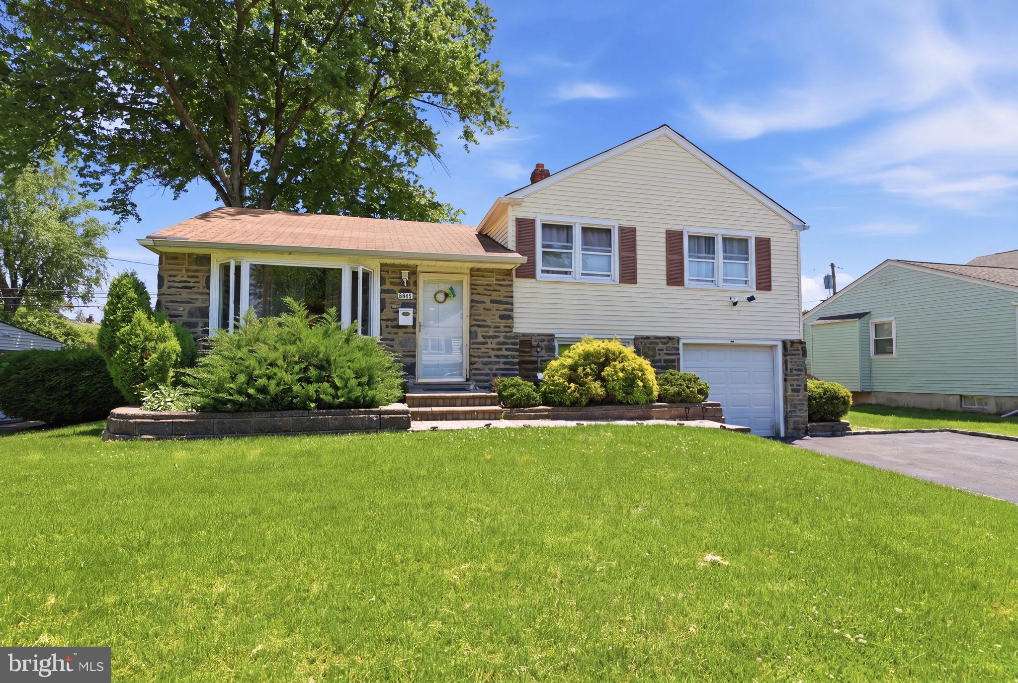 Welcome to 11615 Depue Ave! This stone and siding split-level home includes three bedrooms, one and a half bathrooms, a one-car garage, and a fully finished basement. Arriving at the home, you're greeted by a well-maintained front yard with impressive landscaping. The front door takes you into the living room. The bay window overlooking your front yard lets plenty of natural light into this gathering space. Connecting the living room and kitchen is the formal dining room, complete with a ceiling fan and two large windows overlooking your side yard. Beyond the dining room is the eat-in kitchen. The kitchen is complete with plenty of wood-paneled storage cabinets, a dishwasher, a garbage disposal, a gas stove, and beadboard wainscoting lining the walls. 
Upstairs has three bedrooms and a remodeled full bathroom. Two bedrooms can comfortably fit a queen-sized bed, while the other bedroom can hold a full-sized bed. This room can also be a flex room/office space. Each room comes with its own ceiling fan and its own closet. The shared bathroom is very modern, with a double sink vanity, natural stone walls, and a large soaking tub. The bathroom also has a linen closet for extra storage and an extra closet with attic access. The finished basement is completely carpeted, and the separate laundry room has a half bathroom. The laundry room is also where the door to your attached one-car garage is located, as well as where you access your backyard. Your fenced-in backyard has a covered patio for relaxing on warm summer nights and a shed for additional storage. With plenty of room to roam, this yard is waiting for you to turn it into your own personal oasis. 
This home is located close to shops, restaurants, and grocery stores, and is close to major commuting routes, including Route 1 and 276. Schedule your showing today!
