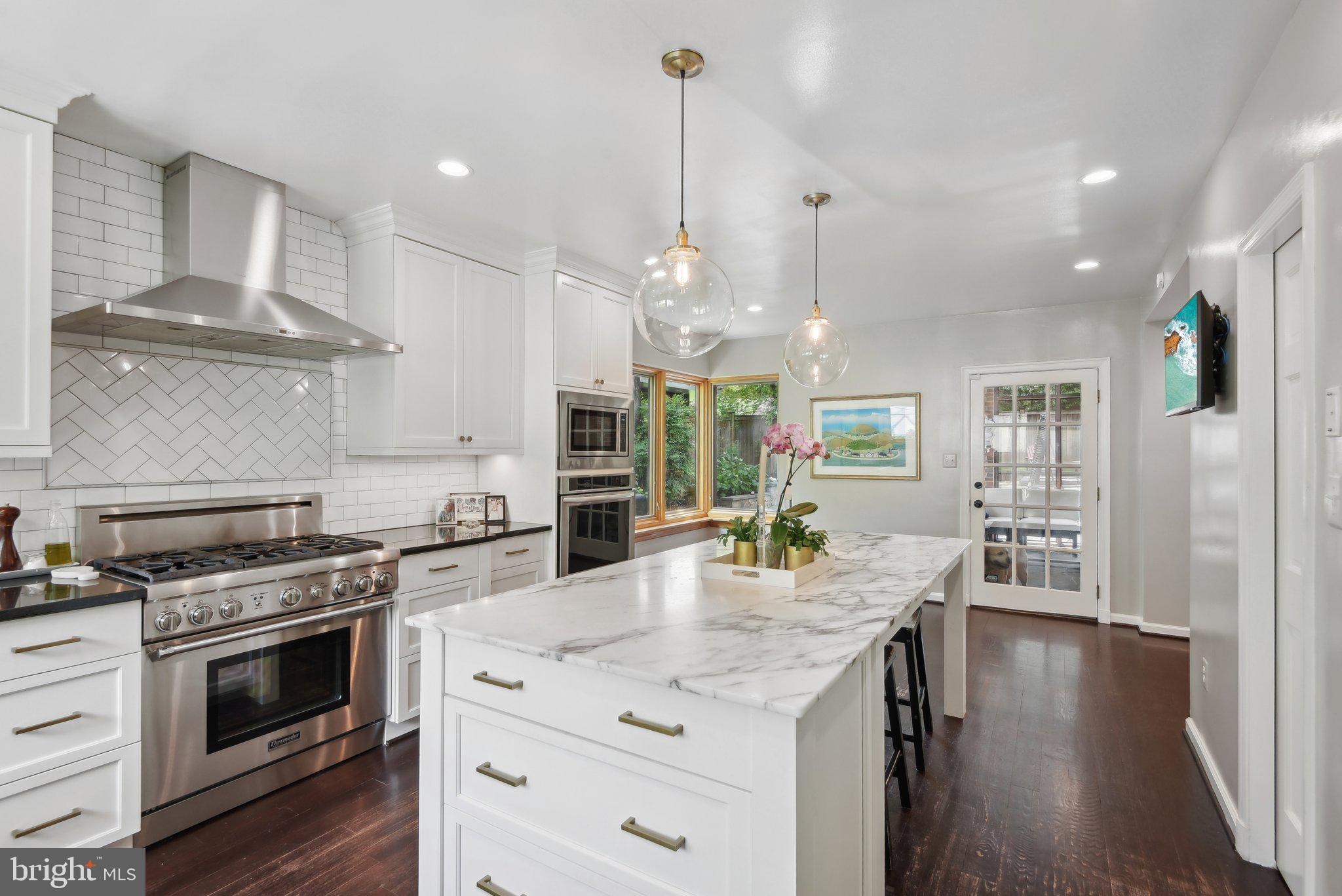 A rare find in the sought-after Brookmont neighborhood.  This all brick well-kept home was fully renovated in 2013 and features 5 fireplaces, a large renovated kitchen, generous pantry, wet bar and updated owner's bathroom.  The 4 generous bedrooms and 3 full/ 2 half baths afford ample living space and a huge private office in back for work-from-home.  Other highlights are laundry on the second floor and a built-in hot tub.  The deep driveway and attached 1-car garage provide plenty of storage opportunities.  From the wonderful screened back porch which seamlessly merges the indoor and outdoor spaces, the house elegantly flows into the landscaped private and fenced backyard.  Exceptional access to the Potomac River, walkable to C&O Canal National Historic Park, and Capital Crescent Trail, catering to outdoor enthusiasts and nature lovers. Enjoy nearby amenities like a park, playground, tennis courts, and a weekly farmer's market at the Village Green.  This home is a very special find in a special location