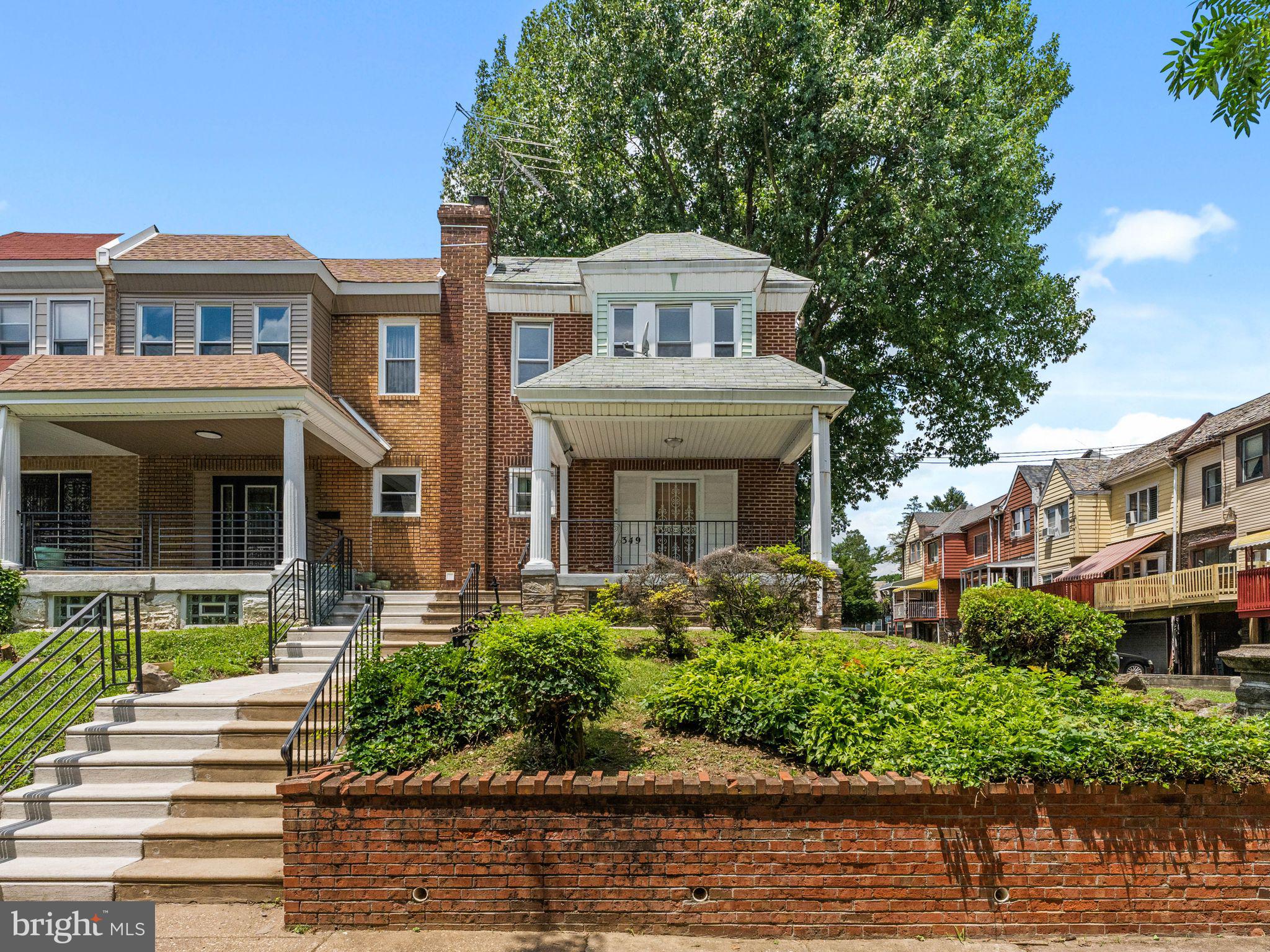 Welcome to 349 E. Montana Street, a charming 3-bed, 1.5-bath corner rowhome nestled on a picturesque tree-lined street in the heart of East Mount Airy. Filled with natural light and classic character, this home offers comfortable living spaces and everyday functionality. Relax on the inviting covered front porch before stepping into a bright and spacious living and dining area featuring new lvp flooring and fresh paint throughout. The spacious kitchen offers abundant cabinetry and generous counter space, making it ideal for everyday living and entertaining. Upstairs, you'll find three generously sized bedrooms with ample closet space and a full hall bath. The finished basement adds valuable living space and features a stove and microwave, making it ideal for entertaining, recreation, a home office, or other flexible living needs. A convenient half bath completes the lower level. Major updates include a new main rubber roof (2025) and a new hot water heater (2026). Additional highlights include a one-car garage, covered driveway parking, and a desirable corner location. Conveniently located near parks, shopping, restaurants, public transportation, and major commuter routes, this home offers easy access to everything East Mount Airy has to offer. The property is being sold in as-is condition. Don't miss this exceptional opportunity to own a home in one of Northwest Philadelphia's most sought-after neighborhoods!