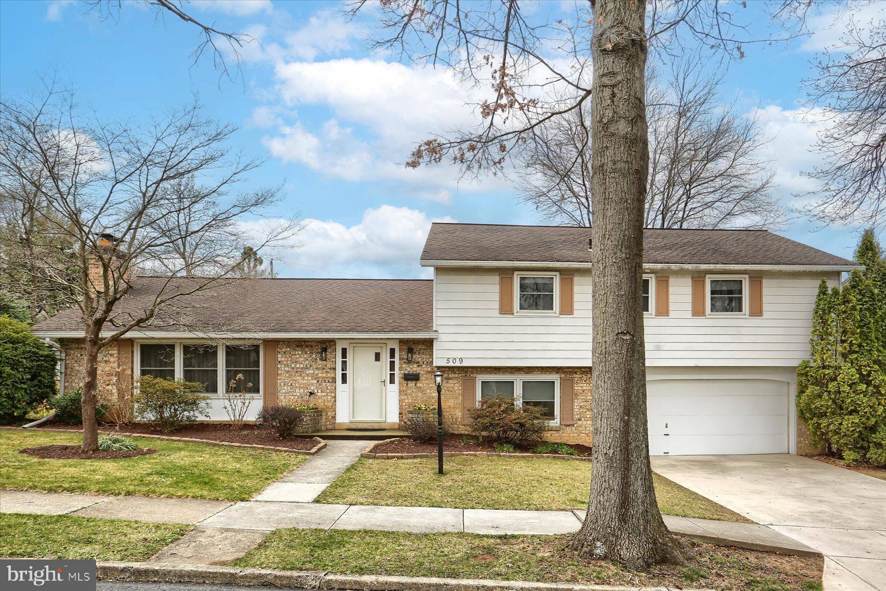 4 Bedrm, 2.5 Bath, Huge Split-Level Home in desirable Latshmere Manor, Quality Construction the way Homes used to be Built, Real Brick, not that lick and stick. Most Splits have 3 levels, This home has 4 levels with a full basement under the Living Rm, Dining Rm and Kitchen, The warmest most comfortable Hot Water baseboard heat w/3 zone thermostats, Low E Double Pane Thermal Windows throughout. New Kitchen & Appliances, Quality Birch Cabinets w/dovetail drawers, Kitchen Island w/electric, Large Pantry Cabinets, Mini split A/C on Main Floor, Look at the Size of these rooms! 12x30 Patio off the Family Room, Oversized heated Garage, Real Wood Burning Fireplace, Fenced Yard, Great Walkable Neighborhood w/ Shopping and School close by. You will Love this home and neighborhood.
