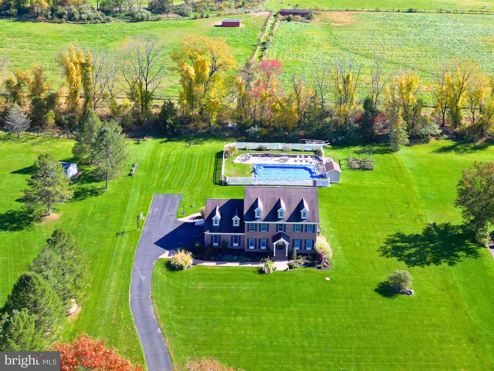 Nestled amidst 1.5 acres and within New Hope Solebury school district,  lies a gracious colonial with plenty of room to grow. This custom-built home has been well maintained and offers endless potential.  Boasting charming views of an in-ground pool and horse farm, the rear yard  space provides the perfect backdrop for outdoor enjoyment. The interiors are a canvas of adaptable space featuring freshly painted kitchen/living rooms as well as hardwood flooring throughout.  A cozy, wood-burning fireplace in the family room allows for total relaxation & the entire house is spray foam insulated, making it extremely energy efficient.  Upstairs there are four bedrooms, including a sprawling primary suite featuring walk-in closets and a primary bath overlooking the rear yard pool. Bring your vision to finish the generous basement which currently provides incredible storage space and has been roughed for a full bathroom.  Exuding curb appeal with its classic brick facade and landscaping, this stately home awaits your personal touches! It provides easy access to distinctive shopping, entertainment, parks, and restaurants, and offers 2 car garage parking with ample driveway space.  Experience for yourself the timelessness and exclusivity this property has to offer. Middleton Lane rarely experiences turnover; its spacious lots, serene location and family-friendly disposition provide comfort, and a high-quality-of-life for the those who proudly reside here. *Interior photos coming soon*