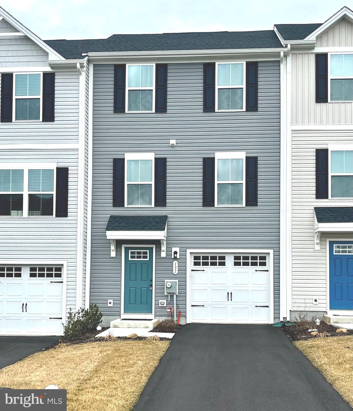 ONLY JOB RELOCATION MAKES THIS LIGHTLY LIVED-IN HOME AVAILABLE!

Welcome to this desirable townhome in the meticulously maintained Valley Square Towns community. Enter from the lower level into a welcoming foyer, or through the convenient attached garage. This level also offers a versatile flex space, perfect for an office, den, home gym, or playroom—endless possibilities to suit your needs.

On the next level, you'll find a beautifully designed, open-concept gourmet kitchen that's ideal for hosting gatherings, as well as a dedicated dining area and large living room, perfect for relaxing or entertaining. A convenient half bath completes this floor.

The upper level features three bedrooms and two full bathrooms, including a generously sized primary suite with its own en-suite bath and walk-in closet. For added convenience, the washer and dryer are located on this level.

Situated on a premium lot that backs up to school-owned land, this home offers both privacy and peaceful views. The HOA covers lawncare, trash service, and snow removal. Don't miss this exciting opportunity!