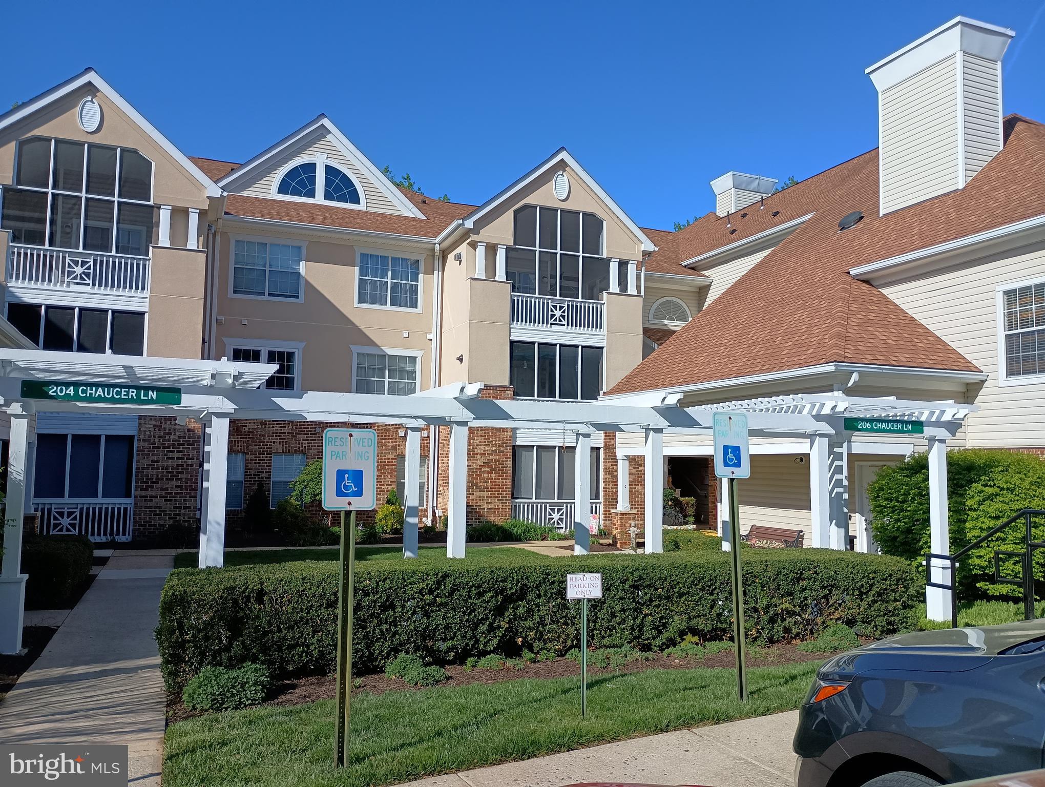 If you've seen the others, you might want to see this one too before your decision is made!!  Cozy 2 bedroom 2 bath 2nd floor condo with a lot of loving care.  Kitchen cabinets have been refaced and new granite countertops in 2021. Stainless steel refrigerator replaced in 2023.  All other appliances are stainless too!  Seller has made extra storage space with pull out drawers on dining side of kitchen breakfast bar.  Dining area right off kitchen with updated light fixture.  Family room is open to the kitchen and the tv is included.  Not enough space, lucky you, a sunroom is right off the family room and open to the screened porch area all backing to woods.  Listen for the owls!!  The primary bedroom has a fabulous walk-in closet with closet organizer and new flooring. Barn doors installed to the closet and the primary bathroom.  Primary bathroom has new floor, vanity and tub tile.  Second bedroom is nice sized with its own bathroom too.  Nice storage closet in the hallway.  Other updates include HVAC in 2021, HWH in 2019, washer/dryer in 2022 and the outdoor screened porch has new ceiling provided by the condo association in 2024. Neutral paint and flooring make this condo move in ready.  Your condo fees include water, sewer, trash pickup, snow removal, community pool, workout room, Manor house with meeting rooms, kitchen and party room. Bulk trash removal available too. Plenty of parking available. So many options for this place to be called home!