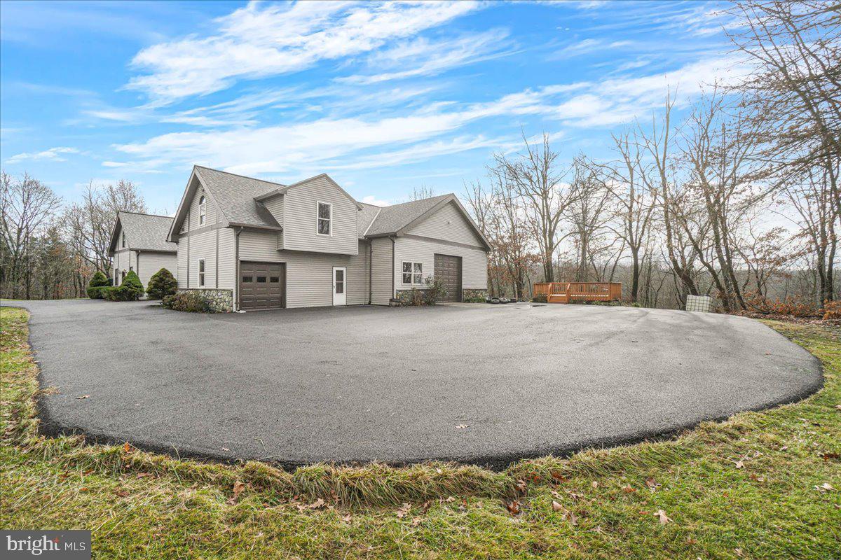 This recently renovated 1-bedroom, 1.5-bathroom guest house apartment is situated on a private 80-acre estate, offering a peaceful and secluded setting on a quiet country road while remaining conveniently close to local amenities. The main level features 9' tall ceilings, wood and tile flooring, a powder room, and a neutral paint palette. The updated kitchen boasts tall white cabinetry, granite countertops, and brand-new stainless steel appliances, with a laundry area/utility closet tucked just behind it. Adjacent to the kitchen is a family room with a 10' tray ceiling and a bonus nook, perfect for office use or additional storage. Upstairs, the spacious bedroom offers wood floors, a fully renovated en-suite bathroom, a closet, and access to an attic storage area. Electric and DirecTV are included, while tenants are responsible for propane usage. Garage use is not included but may be available for an additional fee. Small pets will be considered on a case-by-case basis with applicable fees. Due to septic system limitations, the property allows a maximum of TWO OCCUPANTS and two vehicles. This is a non-smoking property, and the lease term is a minimum of one year, with up to two years available. The home is available immediately, with the first month’s rent and security deposit required at lease signing.  The landlord prefers applicants with a credit score of 670 or higher and a household income of approximately $85,000 or more. Located in rural Damascus, the property provides easy access to major highways, including I-270, I-70, Rt. 124, and Rt. 108, with shopping, parks, and dining just a short drive away. Commuting to Mount Airy, Clarksburg, Gaithersburg, Rockville, Olney, and Frederick is both convenient and manageable. This beautifully upgraded rental is truly a rare find, combining privacy, modern updates, and a charming location. Showings are by appointment only, so please refrain from entering the property without a scheduled showing accompanied by an agent. Tenant to pay $47 screening fee through SmartMove® by TransUnion®.