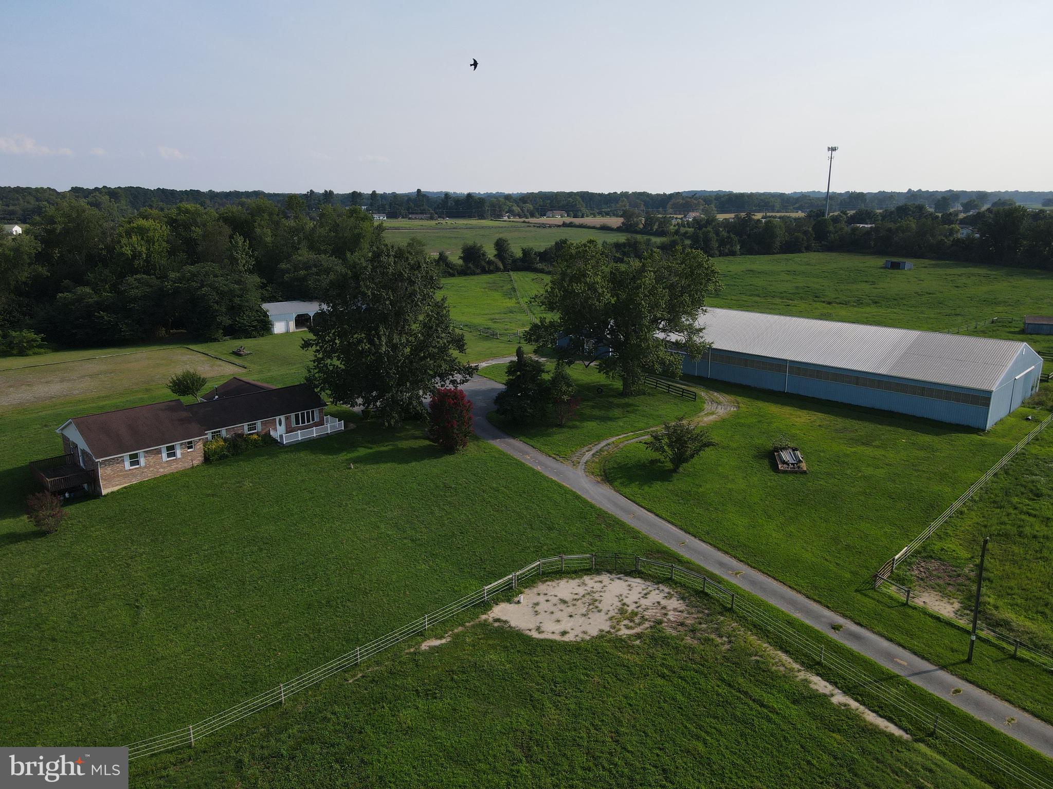 Amazing opportunity!  40 acres of preserved farmland with 4 pastures in South Chesapeake City horse country convenient to Fair Hill, Delaware Park, marinas, and golf courses plus convenient to Chesapeake City restaurants on the canal. Expanded 4 bedroom, 2 bath brick and vinyl ranch with sunroom, primary bedroom with walk-in closet and access to the hall bath and laundry. Full walk out basement and updated roof.  Some of the many horse amenities Include: 10 (12x12) stalls (5 with access to fields) - Attached 70x140 indoor ring with sand footing - Large outdoor ring with 4 season sand footing - 4 strand high tensile fencing with 2 electric strands run by solar - Self waters in all fields - 3 run in sheds  - pond - Wash stall with hot/cold water - Grooming stall - Heated tack room/office with bathroom and washer/dryer hook up - Feed/hay room.  Tiny house included in the sale!  Solar panels on the house for reasonable utility costs!  Hurry to schedule your private tour today!