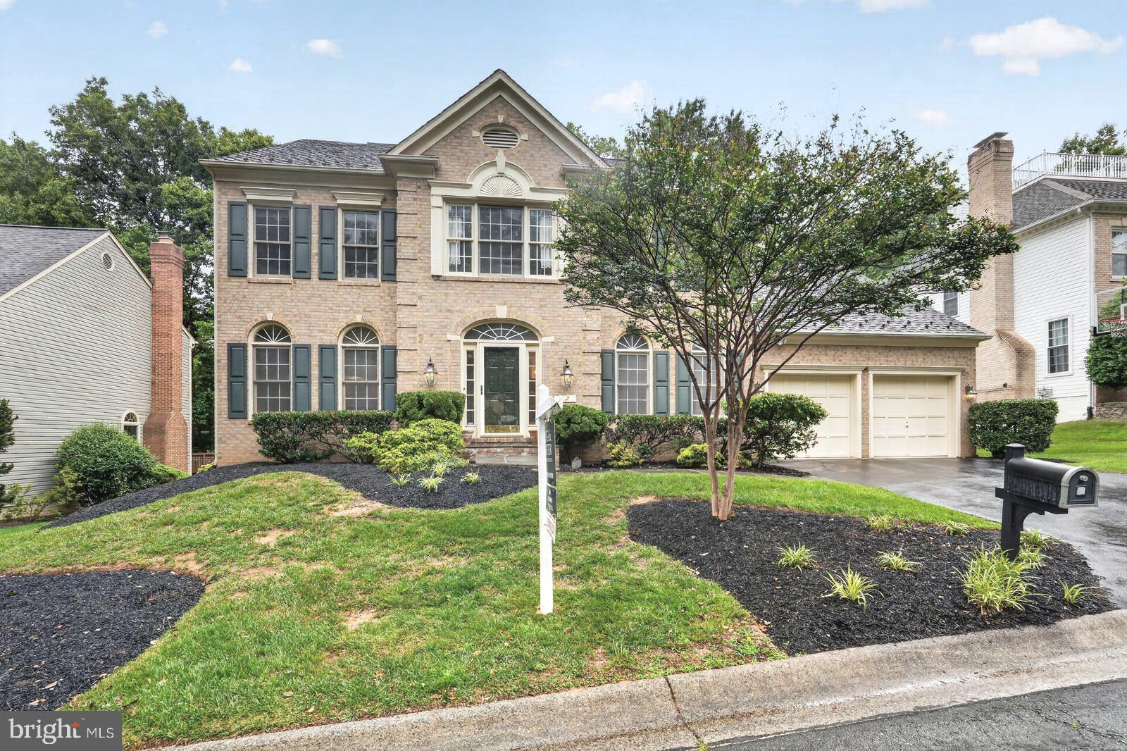 THIS LOVELY BRICK-FRONT 5 BEDROOM, 4.5 BATH COLONIAL IS A GEM! Located on a choice cul-de-sac lot in the highly-desirable Potomac Grove community, with lots of special features such as high ceilings & 3 finished levels of living space, this home will grab your attention! The UPPER LEVEL offers 4 bedrooms & 3 full bathrooms. The primary bedroom has double-door entry and a vaulted ceiling. The primary bathroom has been completely renovated, tiled, with both soaking tub & separate large shower. The beds on this level convey to the new owners. The MAIN LEVEL had a lovely 2-story entry foyer and a large bedroom with double-French-door entry - currently used as an office/library. The Living Room is currently used as a Game Room with a bonus - the pool table conveys to the new owners! The marvelous family room has two unique recessed wall spaces that are 3 feet wide by 5 feet high that beg for decorative creativity. It has a fireplace, vaulted ceiling with skylights, and offers walkouts through 2 sets of French doors to the large custom deck. With a formal dining room, a large gourmet kitchen with breakfast nook, a laundry room, a centrally-located powder room, and level walkouts to a large deck that overlooks the backyard, this level is wonderful for entertaining! The LOWER LEVEL has been largely finished (about 90%). It has an expansive recreation room with 5 storage closets, brand-new carpeting, and a full bathroom. There is also an office and a large storage-utility room.  Another great feature of this level is that it offers level walkout to the backyard. The EXTERIOR is well-landscaped. The 2-CAR GARAGE offers additional storage options and connects directly into the main level. The asphalt driveway can park an additional 2 cars, and there is also street parking. OTHER FEATURES: besides the new basement carpeting, all the existing carpeting has been refurbished, and there are recessed dimmer lights in much of the house. The home's roofing shingles are the highly-rated Landmark TL brand with a 50-year warranty. BEYOND THE PROPERTY, you will find a large variety of restaurants & shops, access to key commuter routes, nearby schools, parks, & recreational amenities. Offering quality construction and thoughtful design, this home will not stay on the market for long. COME SEE THIS WONDERFUL HOME SOON - AND BE PREPARED TO MAKE IT YOUR OWN!