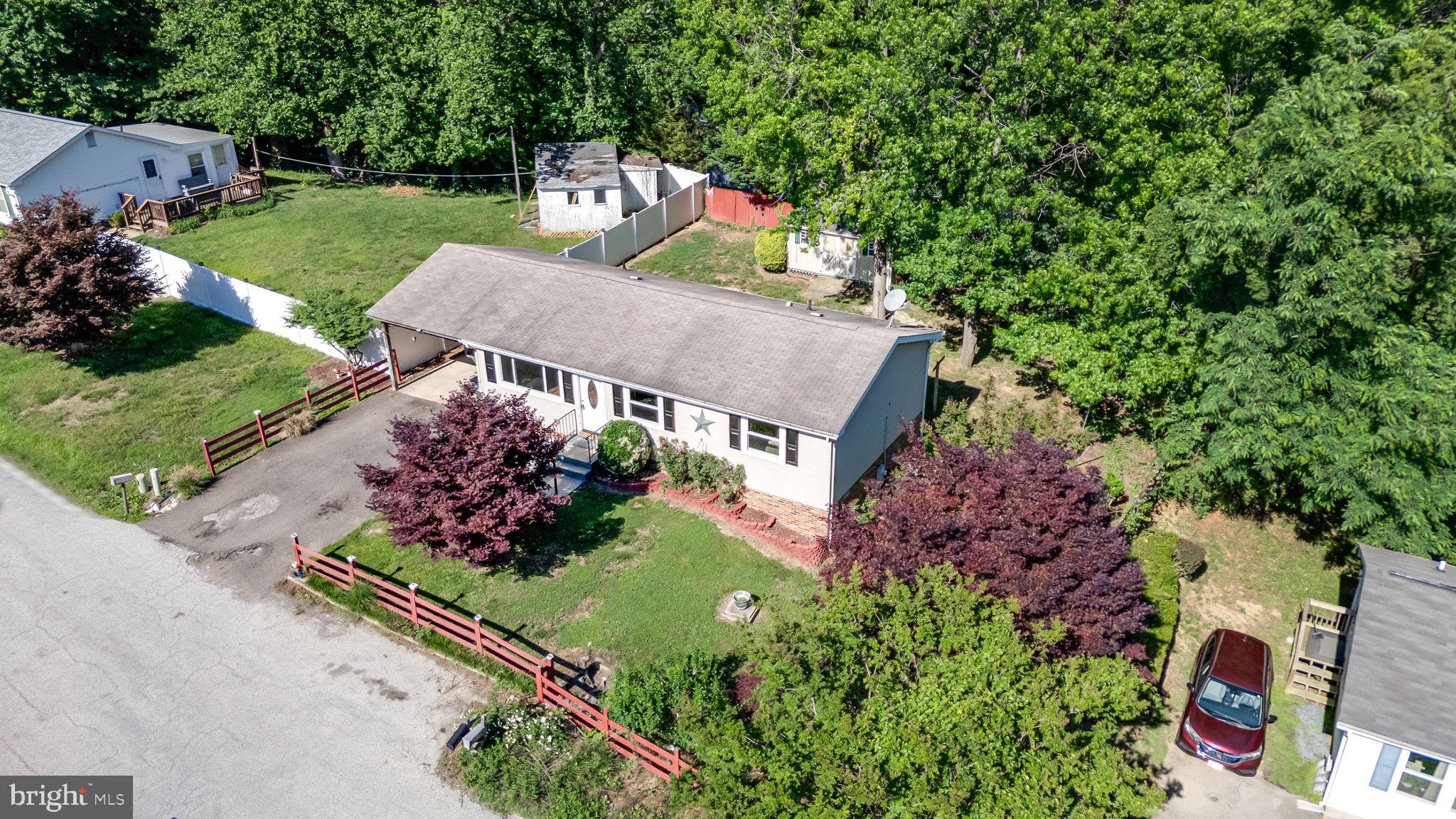 So much to love here in the Chesapeake Beach rambler!  Pull right in to your covered carport and additional off street parking.  Inside you will find a traditional floor plan with a spacious family room leading to the eat in kitchen with updated appliances and granite counter tops.  A separate laundry room offers potential for additional storage or pantry.  Three bedrooms and updated full bath complete the inside.  Newer plank floors, windows and more.  Outback finds a level yard, deck and a storage shed.  Close to all the beaches,  entertainment, restaurants and shopping that the twin beaches area has to offer!