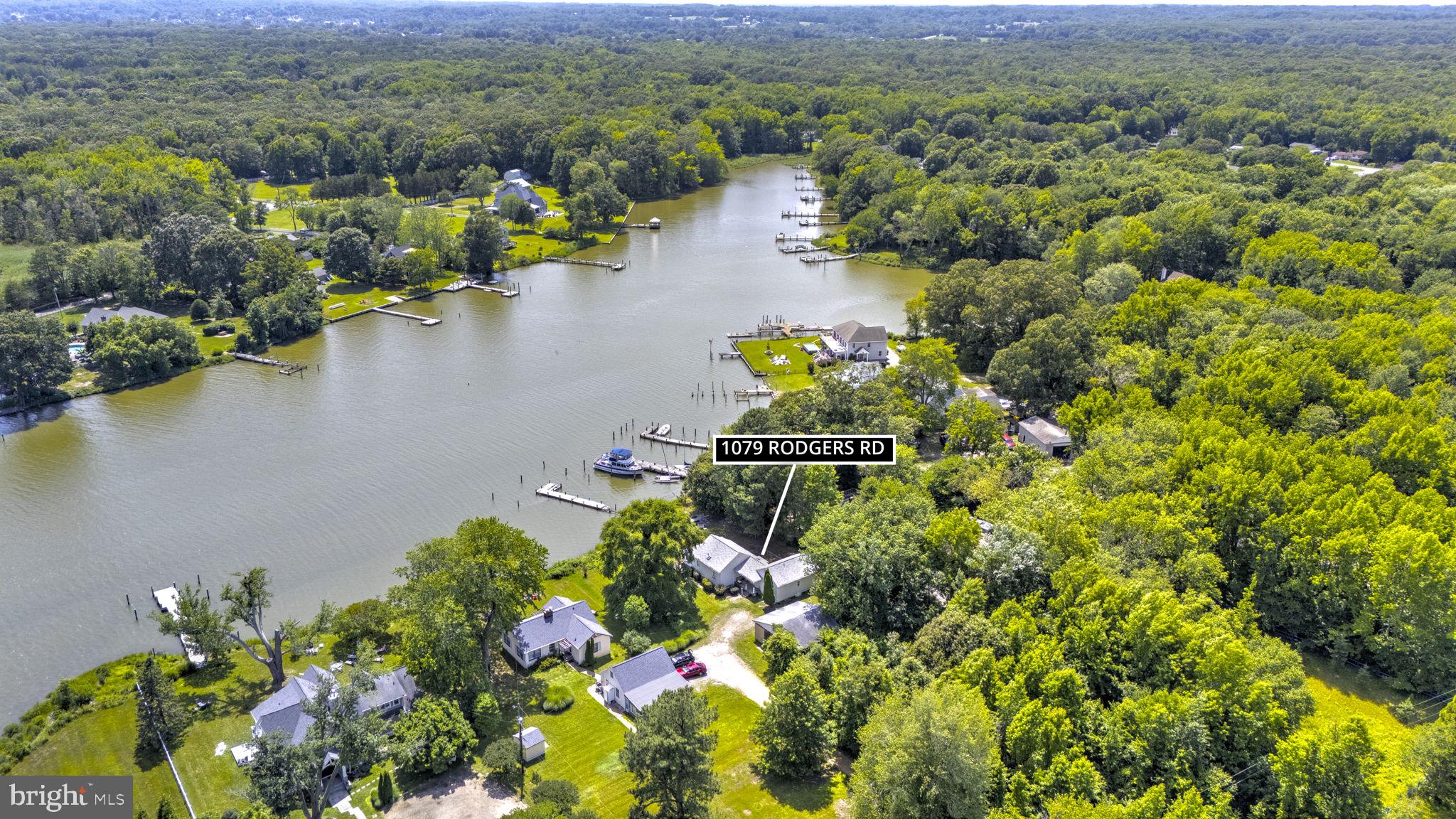 Rare opportunity to own a waterfront retreat on a full acre at an exceptional value. Enjoy privacy, tranquility, and breathtaking views of Broadwater Creek. This charming home offers convenient one-level living with four bedrooms, two full baths, a spacious kitchen featuring a center island, and a waterfront living room showcasing panoramic water views. A detached garage provides ample space for vehicles, boats, or additional storage. The roof was replaced in 2021, adding peace of mind for future owners.Ideally located just 30 minutes from Annapolis and 45 minutes from Washington, D.C., this property is perfect as a weekend getaway, vacation home, or year-round waterfront residence. The price reflects updates needed, offering an excellent opportunity to renovate and customize while enjoying the beauty and lifestyle of waterfront living. Please note that the pier requires significant repairs and should not be accessed. Home is sold "as is".