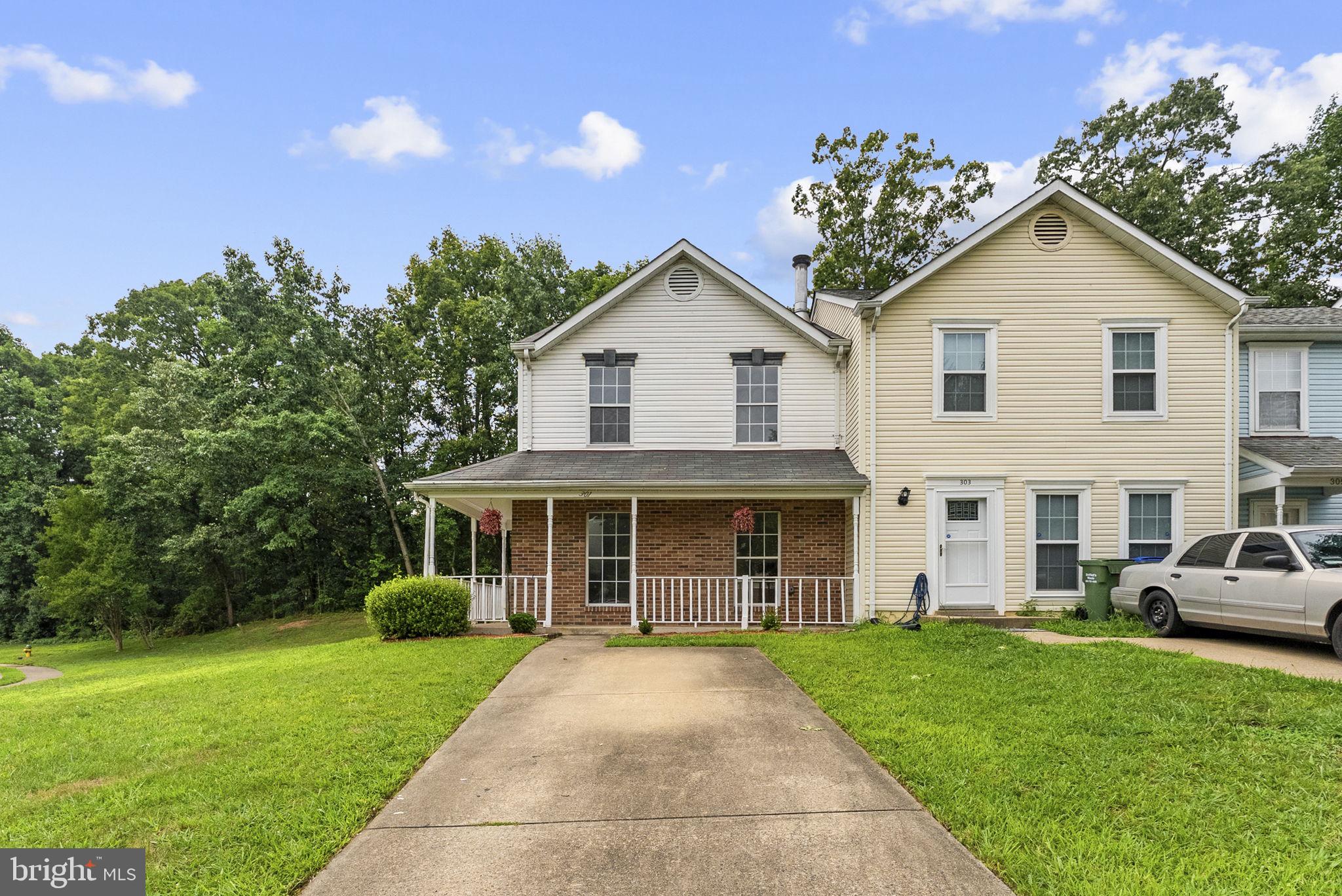 Welcome to 301 Cabin Court! This freshly painted end-unit townhome offers a fantastic opportunity
to own a well-maintained home in a convenient Stafford location with all new paint, laminate flooring on lower level and upper bathroom and all new electrical outlets, switches and covers.  Situated on a desirable corner lot, the home features a welcoming wraparound front porch, a
private paved driveway, and a fully fenced backyard with a storage shed.
Inside, you'll appreciate the new flooring throughout , a spacious living room with a
cozy corner fireplace, a bright kitchen with an adjoining dining area, and a convenient half bath.
Upstairs offers two generously sized bedrooms and a full bathroom, providing a comfortable and
functional layout.
With the major cosmetic updates already completed, this home is ready for its next owner to make it
their own. Ideally located just minutes from I-95, Quantico, commuter lots, shopping, restaurants,
parks, and schools, this is an excellent opportunity for first-time buyers, investors, or anyone
looking to build equity in a desirable Stafford location.