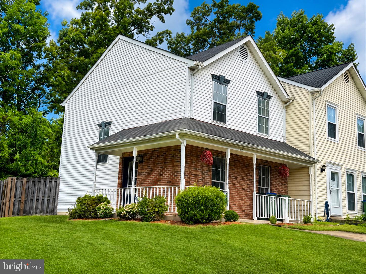 Welcome to 301 Cabin Court! This freshly painted end-unit townhome offers a fantastic opportunity
to own a well-maintained home in a convenient Stafford location with all new paint, laminate flooring on lower level and upper bathroom and all new electrical outlets, switches and covers.  Situated on a desirable corner lot, the home features a welcoming wraparound front porch, a
private paved driveway, and a fully fenced backyard with a storage shed.
Inside, you'll appreciate the new flooring throughout , a spacious living room with a
cozy corner fireplace, a bright kitchen with an adjoining dining area, and a convenient half bath.
Upstairs offers two generously sized bedrooms and a full bathroom, providing a comfortable and
functional layout.
With the major cosmetic updates already completed, this home is ready for its next owner to make it
their own. Ideally located just minutes from I-95, Quantico, commuter lots, shopping, restaurants,
parks, and schools, this is an excellent opportunity for first-time buyers, investors, or anyone
looking to build equity in a desirable Stafford location.