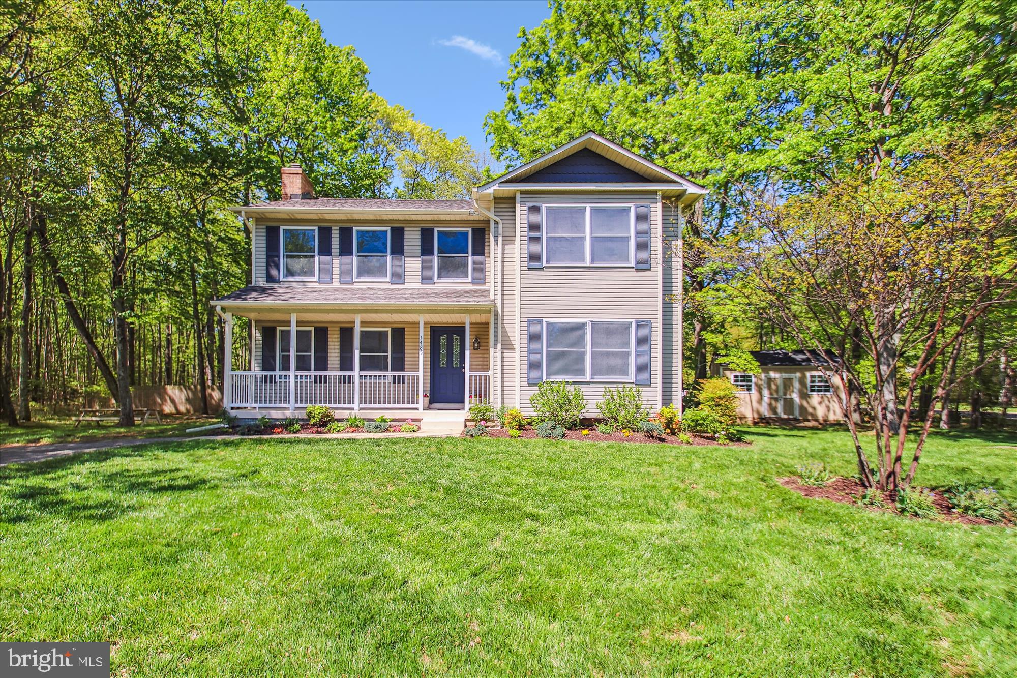 Welcome to this beautifully maintained Colonial nestled on a spacious corner lot in a peaceful cul-de-sac. Freshly painted in neutral tones, this home offers a light and airy feel throughout. The heart of the home is the stunning kitchen—featuring granite countertops, light cabinetry, and a large center island topped with butcher block, perfect for both meal prep and casual dining.
Enjoy your morning coffee or unwind in the evening on the rear deck overlooking nearly half an acre of serene property. Inside, you’ll find gleaming hardwood floors, a dramatic two-story foyer, a grand living room with a cozy fireplace, and a formal dining room ideal for entertaining. The spacious primary suite includes a walk-in closet, an en-suite bath, and elegant French doors leading to a Juliet balcony—offering the perfect way to greet the day without leaving your private retreat. With ample off-street parking thanks to a paved driveway and a quiet setting off the main road, this home offers comfort, style, and functionality in one perfect package. Don’t miss your opportunity to call this property home.