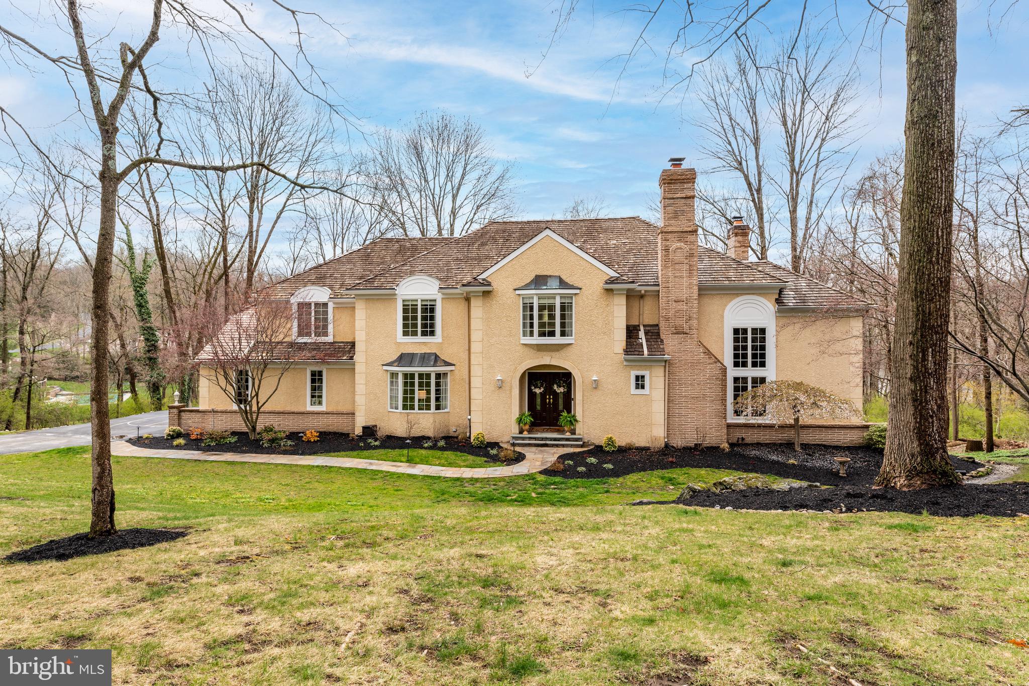 Wonderful French Colonial located on 1.27 acres in the highly desirable neighborhood of Springton Pointe. This home is an Entertainers’ Delight with extensive WATER VIEWS of the Springton Reservoir, large outdoor Deck overlooking the Reservoir, custom pool and attached spa and fire pit area, Finished Basement with Pool Table Room and Movie Room and even a driveway basketball net.

The First Floor features a beautifully decorated Front Hall. Off of the Front Hall is a Half Bath, a Dining Room with a sunny bay window and a large 2-story Living Room with 2nd floor Library Nook and wood-burning fireplace. The expansive, gourmet Kitchen features water views, a breakfast nook with banquette seating, gas range, farm house sink, walk-in pantry and plenty of cabinetry. The Kitchen also features glass doors that lead onto an outdoor deck overlooking the reservoir and pool, perfect for dining al fresco on dreamy summer nights. Open to the Kitchen is the Family Room with water views and a brick wood-burning fireplace. Attached to the Family Room is the bright, 3-season Sunroom featuring expansive water views and features glass french doors and new skylights. There is also a walk-in Pantry and entrance to the large 3-car garage with newer epoxy flooring. 

Upstairs there are hardwood floors and ample closet space throughout. The Primary Bedroom Suite features a water view, walk-in closet with washer & dryer, 2 additional double closets, plus a Bonus Room that could be used as an Office, Nursery or even an extra oversized walk-in closet. The renovated attached Primary Bathroom features a double vanity, spacious shower, toilet closet and soaking tub with a water view. There are 3 additional bedrooms, each with a double closet plus a huge Hall Bathroom with double vanity, oversized shower and soaking tub. The walk-out Finished Basement features plenty of entertaining space and storage, a full Bathroom, Pool Table Room, Exercise Room and Movie Room with projector TV. There is ample storage in the  unfinished area. Exiting through the Basement sliding doors is a hardscape patio as well as a finished Pool changing  and storage room.

Enjoy easy living with newer, renovated kitchen and baths, lower taxes, new Septic System (2024) and Geothermal HVAC. Stucco has been inspected and minor repairs made (2024). Quality details abound with Cedar Roof, hardwood floors throughout most of the 1st and 2nd floor and custom finishes and moldings.

This magnificent home is located within award-winning Marple-Newtown School District and also close to some of the best private schools in the country. It is just a quick drive to Media Borough, West Chester and the Main Line, all with an impressive array of upscale restaurants and shopping, and close to Ridley Creek State Park offering fishing, biking, running, and walking trails.