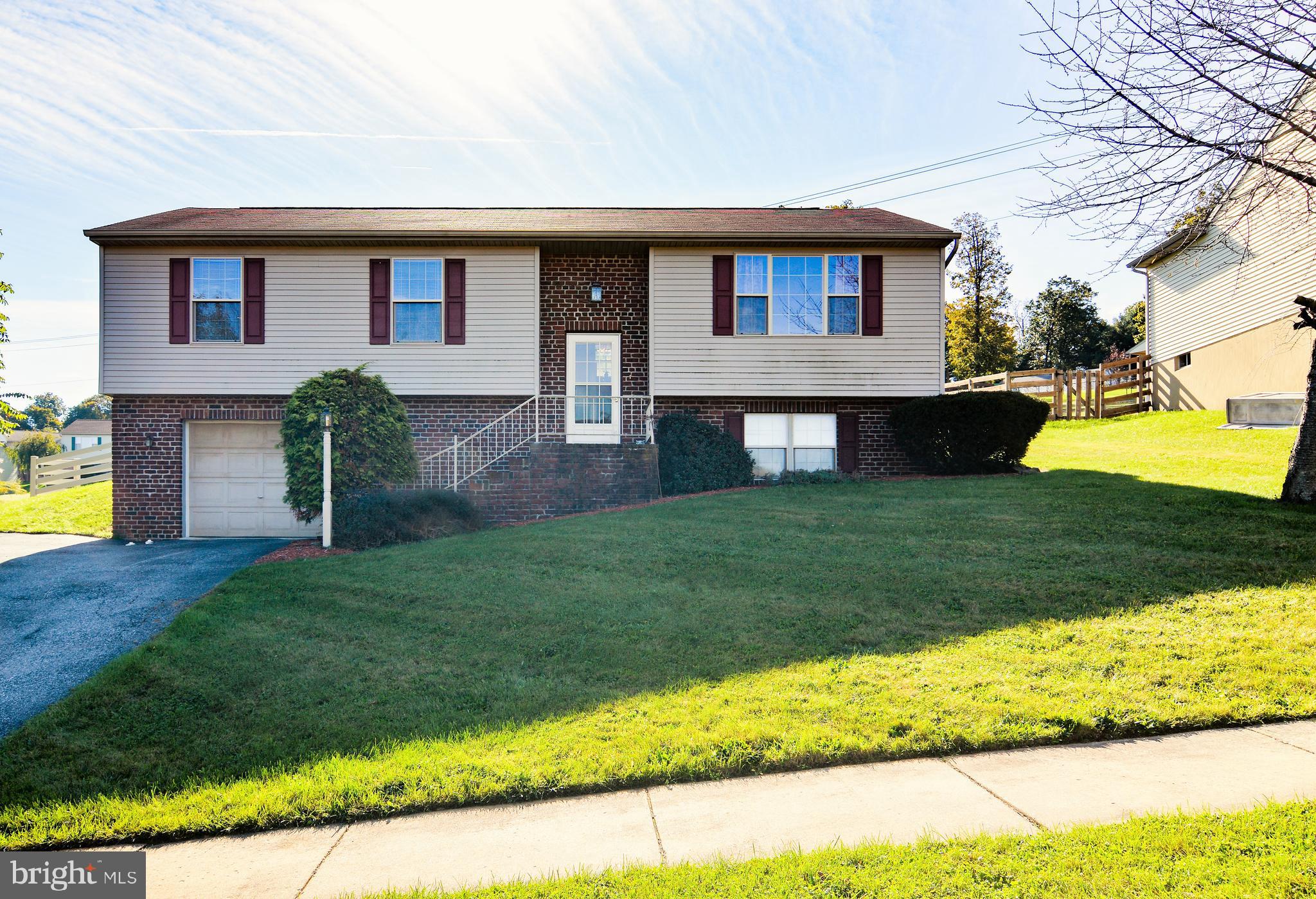 Very nice 4 bedroom, 2.5 bath raised rancher in Red Lion School District. Fenced yard and nice deck to spend summer evenings on. 1-car garage and parking pad for 2 more cars. Big family room with gas fireplace in basement.
