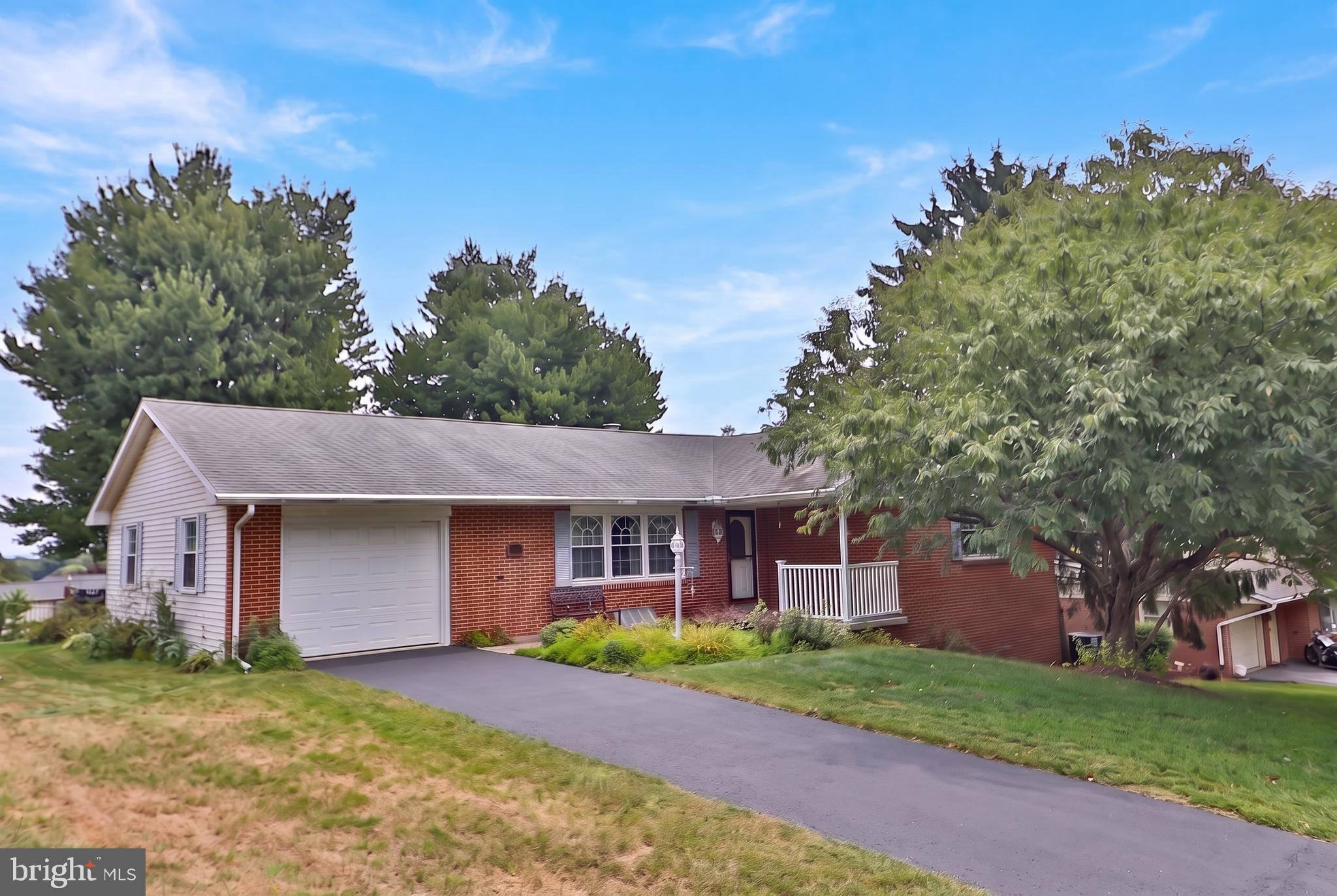 Introducing this charming brick ranch in Manheim Borough, lovingly maintained by its original owner since 1973. This well‑cared‑for home offers comfortable one‑floor living with three bedrooms, two full baths, a kitchen featuring solid wood cabinets, a dining area, and a warm, inviting living room filled with natural light.

The finished lower level provides exceptional bonus space—perfect for entertaining, hobbies, or extended living. Enjoy a built‑in bar, a spacious family room, a recreation room anchored by a brick fireplace, an additional bedroom, and a third full bath. Dedicated laundry and storage areas add everyday convenience and functionality.

Step outside to a large maintenance‑free deck overlooking yard—Small fenced area ideal for pets, gardening, or outdoor gatherings. Situated on nearly one‑third of an acre, the property offers room to spread out while still being easy to maintain. With solid construction, thoughtful updates over the years, and a layout that suits a variety of lifestyles, this home is ready for its next chapter.

Explore the property from anywhere. View high‑resolution photos, launch the full 360° virtual tour, or enjoy an immersive VR walkthrough via the Kuula link. Prefer video? Search the property address on YouTube to watch the guided home tour.