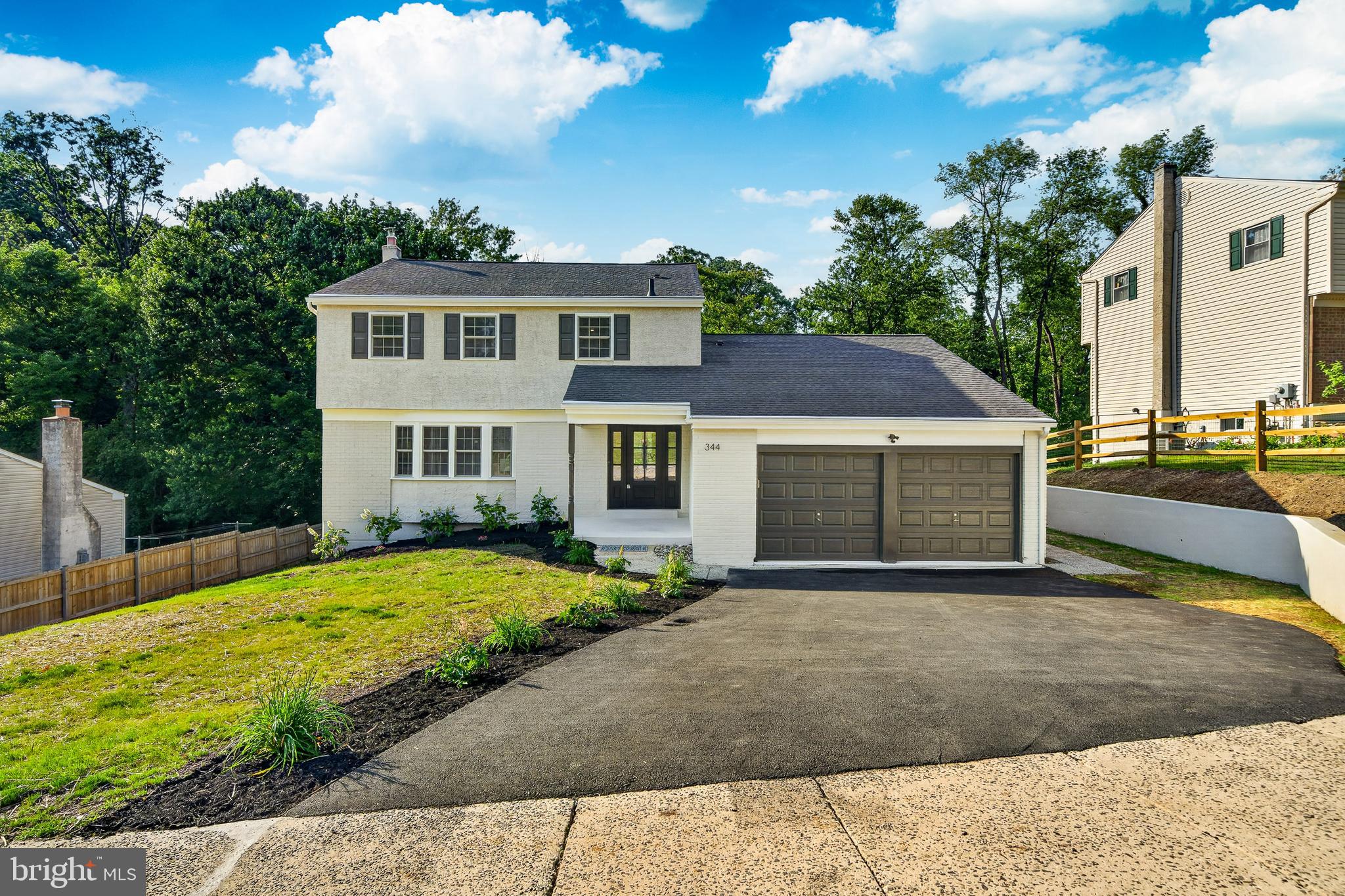 Welcome to 344 Covered Bridge Road, a completely reimagined home in King of Prussia perfectly positioned on a quiet cul-de-sac where tree-filled views and access to the Crow Creek Trail make every day feel like a retreat. From the moment you arrive, fresh landscaping, a new front door, and a modern retaining wall signal that something special awaits inside.
This home has been renovated from top to bottom with no detail left unchecked, a true total renovation that touches every system, every surface, and every room. Take in the new engineered hardwood floors as a completely reimagined open-concept layout creates easy, connected living. The kitchen is the heart of it all, with solid wood cabinetry, granite countertops, a fresh backsplash, and stainless steel appliances coming together in a space that is as functional as it is beautiful. The family room, with its fireplace and a vaulted ceiling, opens directly to the patio, making indoor-outdoor living effortless. A conveniently located powder room and mudroom with garage access and laundry hookup round out this main level.
Upstairs, a custom railing leads you to a primary suite that has been thoughtfully redesigned to include a walk-in closet and an expanded en-suite bathroom with a new shower, new vanity, new mirrors, and new flooring. Three additional bedrooms each received the same careful attention with new closet doors, new carpeting, new windows, and recessed lighting throughout. A beautifully updated hall bath with a new tub and a generous 60-inch vanity completes this level.
The lower level offers a finished walk-out basement with nearly a full wall of built-in storage closets, a flexible space ready to grow with you.
Behind the walls, the renovation goes even deeper. A new York HVAC system with a 10-year warranty, all-new ductwork, a full rewire of the entire house, a new 100-amp electrical panel, Cat 6 Ethernet connecting every room, new plumbing throughout, and new outlets and switches in every room.
Outside, new regrading, lawn seeding, a new driveway, and a new drain complete a property that has been reshaped at every level. The cul-de-sac setting offers privacy rarely found so close to everything King of Prussia has to offer - take a walk along Crow Creek Trail to play at Sweetbriar Park or grab a slice at Angelo’s Pizza, or walk right from the home to Caley Elementary School. A quick drive to the Community Center and Township Library, not to mention the mall and the bustling King of Prussia Town Center, all with the benefit of low township taxes. Move right in and enjoy a renovation done right!