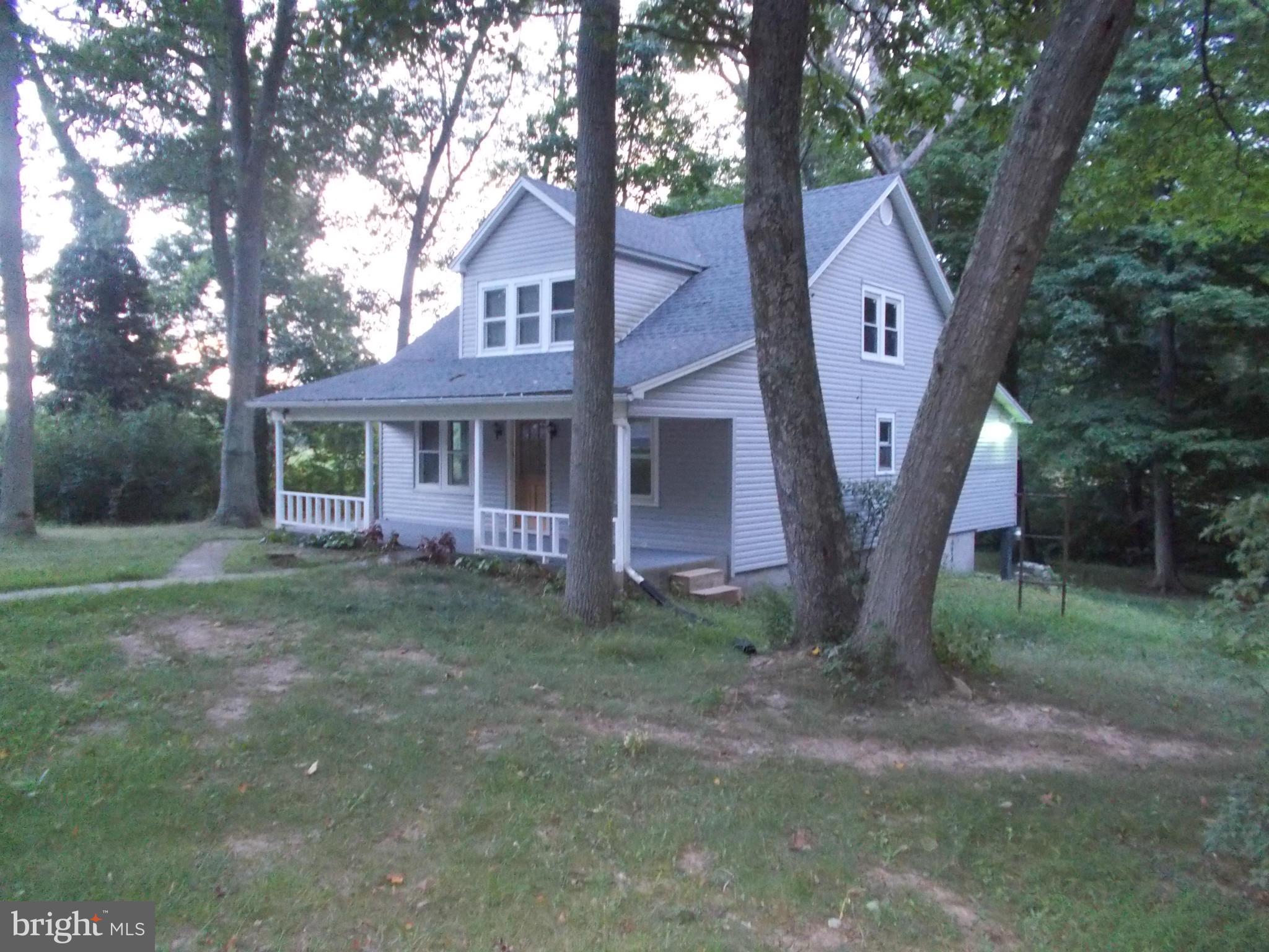 Country home with 4 bedrooms, 2 baths. Nice stream in back of property.  Near state game lands.  Country living at it's best.