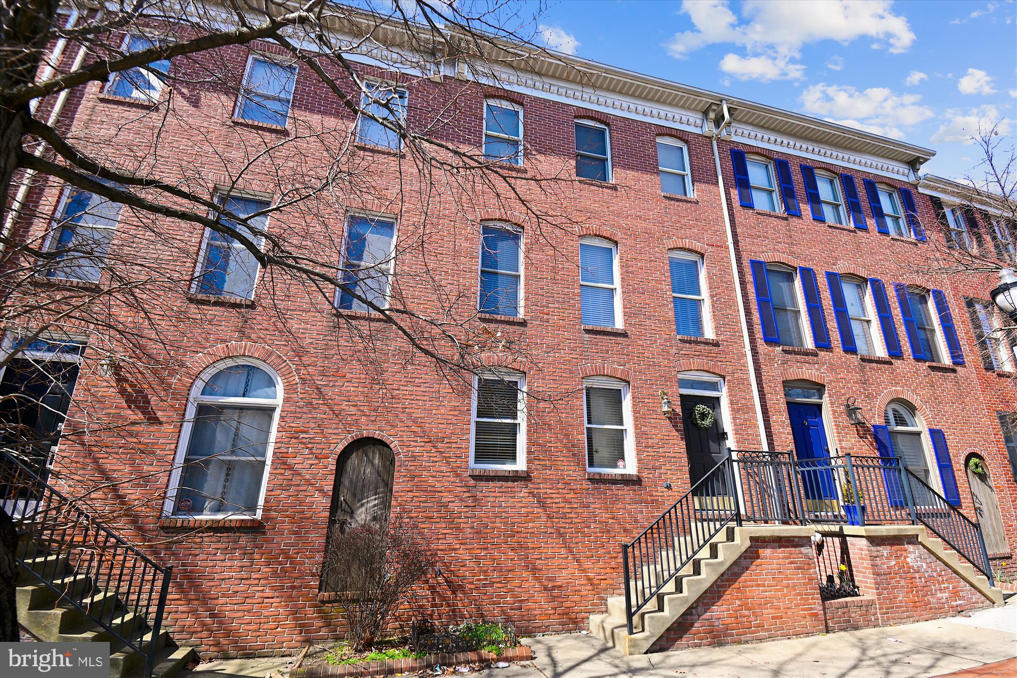OFFER DEADLINE IS MONDAY THE 14th AT 5pm. NO ESCALATIONS. Please email LA if you plan to write.  Turn key 4 bedroom, 3.5 bath townhome in conveniently located Montgomery Square. TWO CAR GARAGE. Third car parking if needed behind on the parking pad. A traditional garage townhome floor plan with one bedroom and bath on the lower level and three bedrooms and two baths upstairs. ALL FOUR BEDROOMS ARE ABOVE GRADE. Open updated kitchen and dining areas, large living room with gas fireplace and marble hearth, master bedroom en-suite with large walk in closet, deck off of kitchen, wood blinds throughout. Great location for access to Federal Hill, down town, Inner Harbor, stadiums, Marc Train, University od MD medical. SHOWINGS CAN BE BOOKED ON SHOWINGTIME NOW FOR SHOWINGS STARTING SATURDAY, MARCH 12. OPEN HOUSE MOVED TO SUNDAY MARCH 13 at 12 - 12-1:30pm.