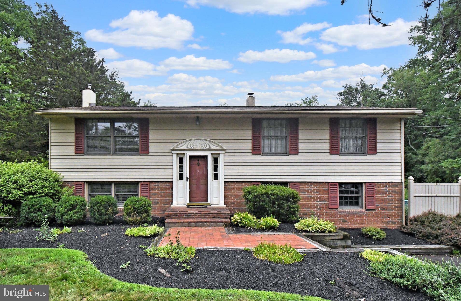 Welcome to 2390 Lenhart Rd!! This 4-bedroom, 2.5-bath single-family home is situated on a beautiful lot in Hatfield Township. The main level features a kitchen with Corian countertops, tile backsplash, center island, recessed lighting, and double sink. The adjoining living and dining rooms offer hardwood flooring and crown molding. The upper level includes the primary bedroom with hardwood flooring and private access to the attached bath with a walk-in tile shower. Two additional bedrooms, both with hardwood flooring, and a full hall bath complete this level. The lower level features a spacious family room with crown molding, wainscoting, a coal stove, and a sliding glass door leading to the tiled sunroom with a built-in bar and access to the large deck overlooking the backyard. This level also includes the fourth bedroom, a dedicated office area, a powder room, and a laundry/mudroom with utility sink and exterior access. Conveniently located and ready for its new owner.  This home is easy to show and ready to go!!