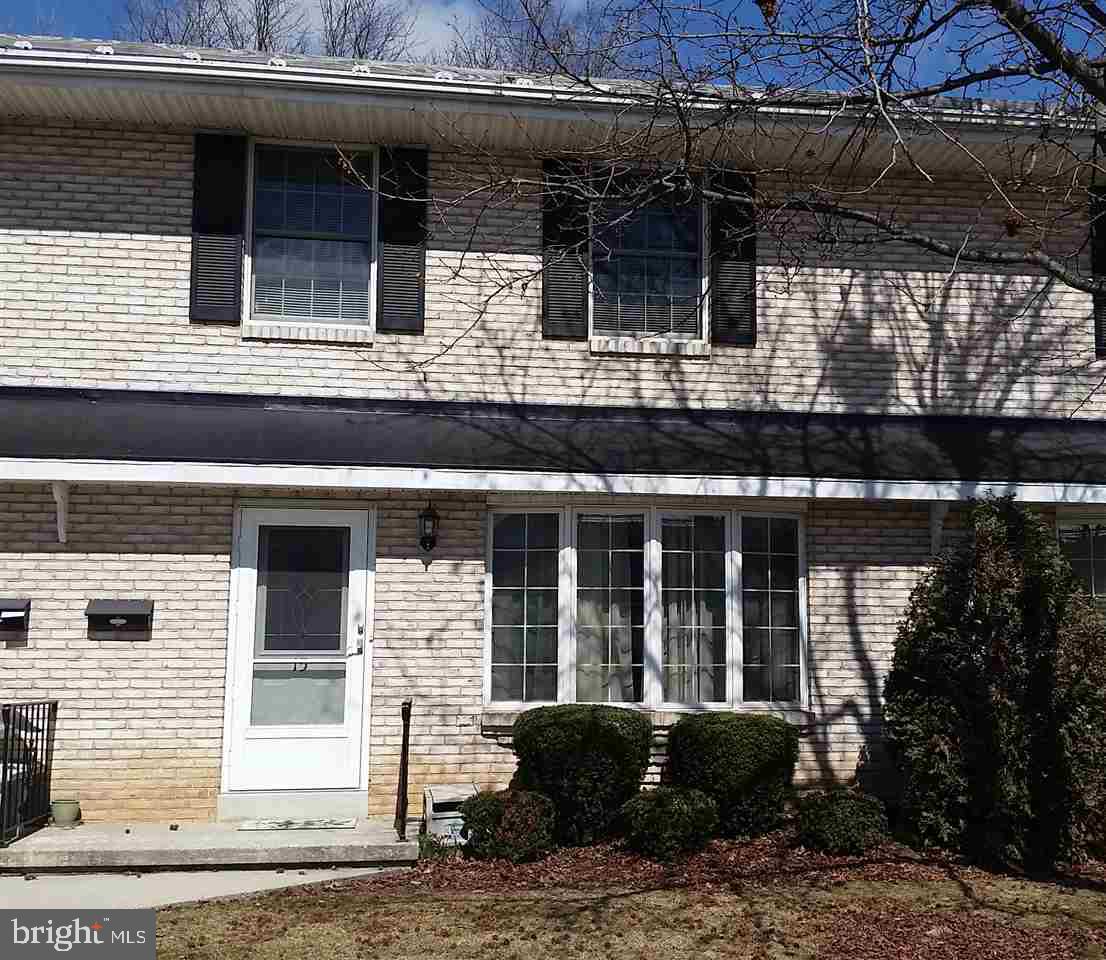 Spacious; Well maintained & ready for immediate possession. Conveniently located close to shopping & I-81. 2 large bedrooms each w/ its own bath. First floor powder rm, Lg Living rm with bay window. Formal Dining rm, wood flrs, Large Kitchen, rear deck for entertaining.  Wide stairs make the move in easy! Full basement for storage or finish for additional living space. Assn fee covers snow removal, lawn care, outside maintenance