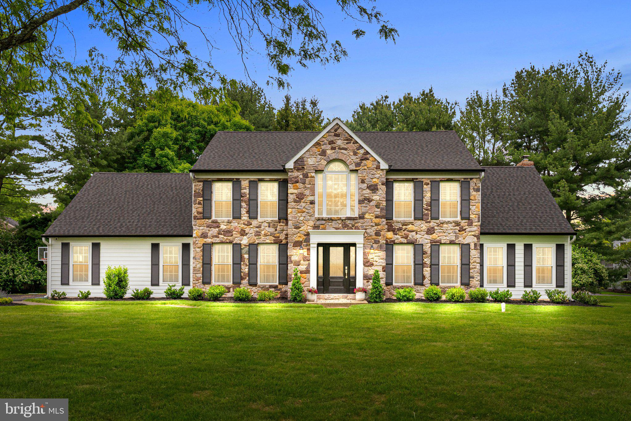OPEN HOUSE, MAY 19th CANCELED! OFFERS DUE May 19, 2024 by noon! 
Welcome to 15 Bakers Drive, a charming residence nestled in the serene neighborhood of Upper Makefield's River Knoll. This beautiful home boasts a classic design with modern amenities, offering comfort and style in equal measure. Upon arrival, you'll be greeted by a manicured front yard, beautiful stone facade and new windows and doors.  Step inside to discover a luminous interior featuring hardwood floors and elegant finishes! The living room and dining room areas feature charming wainscoting and an abundance of natural light, ideal for both relaxing and entertaining. The kitchen is a chef's delight, equipped with 42-inch cabinets, built in pantry storage, a beautiful island with seating, a farmhouse sink peering over the back yard and ample counter space. Stainless-steel appliances, a Verona electric oven with pot filler add to the appeal, while the modern tile backsplash lends a contemporary touch.
Flowing seamlessly from the kitchen is the cozy family room, complete with a wood-burning fireplace, perfect for hosting gatherings and dinner parties. A versatile office on the main floor offers additional space, suitable for various needs, including a playroom. The finished basement with new Luxury Vinyl Plank Flooring, provides extra living or recreational space. 
Upstairs, you will find 5 spacious and inviting bedrooms, each offering a peaceful retreat after a long day. The primary bedroom stands out with California shutters, a walk-in closet,  and a charming reading nook looking over the front yard. The luxurious en-suite bathroom is complete with clean lines a double sink, large shower, and free-standing soaking tub. Outside, the backyard offers a private sanctuary with a patio area for outdoor dining and lush greenery creating a peaceful backdrop. 15 Bakers Drive offers a lifestyle of comfort and convenience. Don't miss the opportunity to make this wonderful house your new home in Washington Crossing!