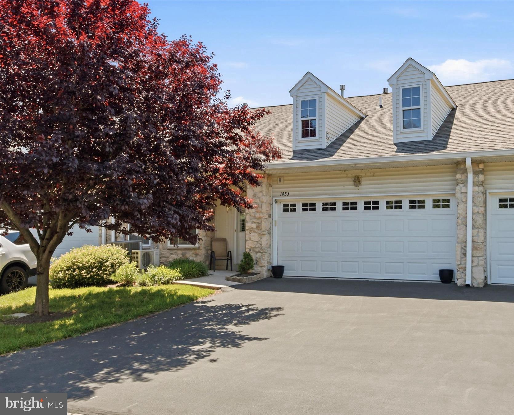 Welcome home to the highly coveted Villas in Golf View Estates - a very popular and beloved over 55 community where you can enjoy the simple life ! No more need to worry about any lawn care!  You will have snow removal to your doorstep , all lawn and landscape care and exterior maintenance but you will have the ability to personalize with planting flowers if desired.  Speaking of exterior maintenance the entire community had their roofs replaced in 2020/2021. 1453 Palmer has a very private front facing entry with ample guest parking out front.  The bright and updated eat-in kitchen with breakfast nook & pantry is the perfect space for more intimate meals.  The stunning wallpaper has elevated the home providing a warm and sophisticated environment.  The dining room is large enough for comfortable entertaining and the living room is the central focus between two bedrooms. One very large bedroom is the primary suite with a walk-in closet complete with an organization system and another second closet with shelving. The primary bath features wood cabinets, a double sink, and a shower with seating area. The second bedroom is located on the other side of the living room and features a large closest.  This room is often used as a den or office space.   The hall bath is accented by wood cabinetry, and a tub. From the living room, exit through the sliding door to a nice white deck with a remote controlled awning . This is where you can enjoy all day sun starting with a morning cup of coffee and end the day relaxing  over an evening cocktail outside.  The laundry room is right off the foyer and a two car oversized garage offers inside entrance , extra storage and a newly installed mini split air system to keep the garage warm during the cold winter months and refreshing during the muggy summer heat.  To top it all off, the heater was just replaced in 2022 ( Lennox Elite) along with a new hot water heater. The association also recently re-coated the driveways and installed new roofs. This location can not be beat - quiet and serene, yet so close to transportation and anywhere you want to go, your family and friends close by, the newer Springfield YMCA and newly updated Springfield Country Club. Isn't it time to stop looking and start living a simpler life? !