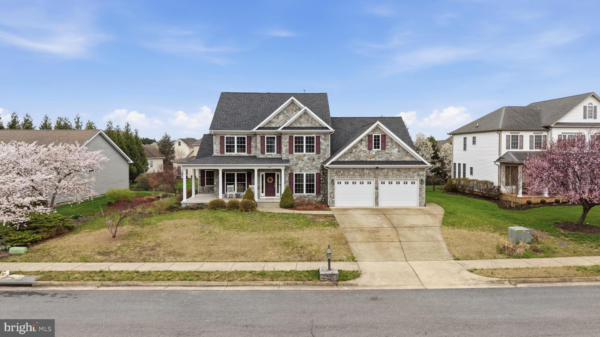 UP TO $5000 SELLER CONCESSION FOR PAINT. CALL FOR DETAILS. Welcome to this stunning Colonial estate nestled in the highly sought-after Raven Pointe neighborhood of Winchester, VA. This exceptional home flawlessly pairs a grand interior layout with panoramic views, perfectly situated directly adjacent to peaceful farmland while remaining just 7 minutes away from historic Old Town Winchester. Built in 2016, this stone-accented detached single-family home boasts a massive 4,714 total finished square feet across three fully completed levels. Positioned on a beautifully manicured 0.27-acre lot, it offers an incredible footprint featuring 6 bedrooms, 4 full bathrooms, and 1 half bathroom—delivering unparalleled space and versatility for multi-generational living or working from home. The main level welcomes you with an open, light-filled architectural flow anchored by high ceilings and formal dining spaces. Cozy up next to one of the 2 fireplaces or enjoy entertaining guests in the spacious living area. A massive primary suite functions as your own private oasis, accompanied by generously sized additional bedrooms upstairs. The lower level features a fully finished walk-out basement equipped with interior access and structural step-up design, ready for a home theater, gym, or separate recreation space.  Includes a spacious 2-car attached front-entry garage with an automated door opener. Situated immediately next to sprawling local farmland, offering an authentic country-style retreat without sacrificing suburban convenience.  Experience the premium neighborhood presentation of Raven Pointe with a low, budget-friendly fee of just $95 annually. Don't miss the chance to own this meticulously maintained, newer-construction masterpiece that balances rural tranquility with city conveniences. Schedule your tour today!