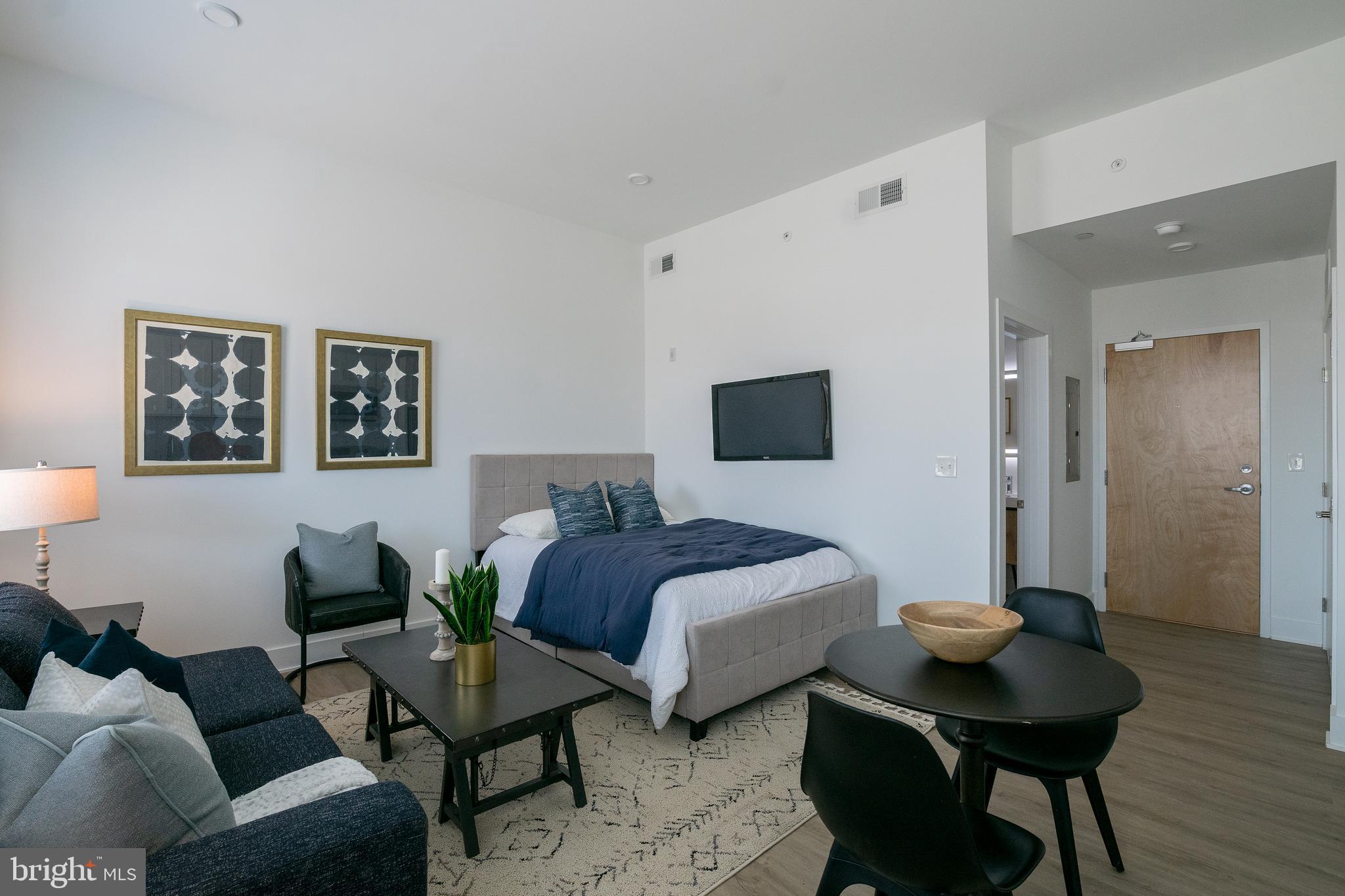 *Available 7/1!*

Live in a new beautiful 38-unit construction apartment building at 2235 Washington Avenue! Situated in the charming Graduate Hospital neighborhood, this building is near many local conveniences, restaurants, and attractions that are sure to make for an enjoyable living experience. The walkability is unparalleled as you can reach the Schuylkill River Park, larger stores like Target and Sprouts Farmers Market, plus smaller businesses like The Sidecar Bar & Grille and Loco Pez, all by foot! Public transit is also accessible via Washington Avenue and Broad Street, and you are close to I-76 for traveling in and out of the city.

This 1 bedroom, 1 bathroom apartment is a CORNER unit and has great city views throughout thanks to its many windows! The spacious layout features a sizable living and dining area that connects to the beautifully designed kitchen. Enjoy stainless steel appliances, quartz countertops, white cabinetry and stylish honeycomb backsplash. Down the hall you will find a spacious and sunny bedroom with its own closet, which is adjacent to in-unit washer and dryer. Finally, the contemporary full bathroom is one of the largest in the building and features a shower/tub as well as a sleek vanity with a unique lighted mirror. Finally, enjoy building amenities that include a shared roof deck with stunning city views as well as a convenient bike storage room. Don’t miss the chance to live in this transformative part of town that is truly near all the best that Philly has to offer!

Lease Terms: Generally, 1st month, and 1 month security deposit due at, or prior to, lease signing. Other terms may be required by Landlord such as last month’s rent upfront. $65 application fee per applicant. Tenants are responsible for: electricity, gas (if applicable), cable/internet and $10/mo technology fee. Water is a flat monthly fee of $60. Additional fees or requirements may be applicable for units with Homeowners or Condo Associations. Landlord Requirements: Applicants to make 3x the monthly rent in verifiable gross income, credit history to be considered, no evictions within the past 5 years, and must have a verifiable rental history with on-time rental payments. Exceptions to this criteria may exist under the law and will be considered. Cosigners will be considered.

*1 dog OK (max 45 lbs), NO cats. $50/mo pet rent required.
*Photos of a similar unit in the building – finishes will match, layout may differ slightly