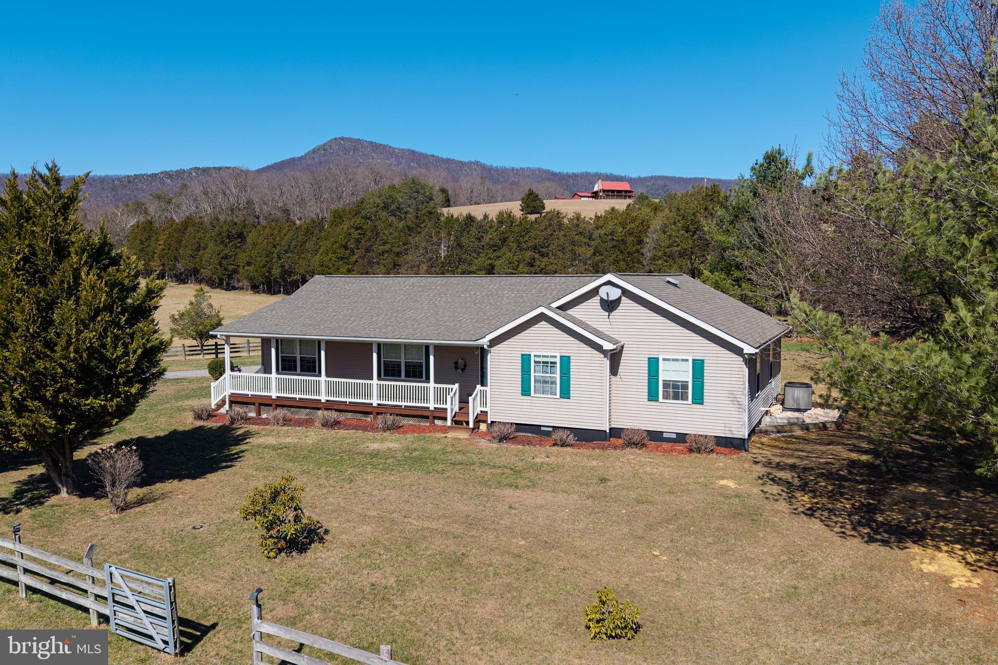 Fantastic 11.15-Acre Farmette with Stunning Mountain Views Near the Shenandoah River!
Escape to the beauty of the countryside with this wonderful 11.15-acre Farmette offering breathtaking mountain views and peaceful surroundings just minutes from the Shenandoah River. This spacious 1,972 sq. ft. ranch home provides comfortable one-level living and the perfect setting to relax and enjoy nature.
Step onto the large covered front porch, the ideal place to sip your morning coffee or unwind in the evening while taking in the gorgeous mountain scenery. Inside, the home features 3 large bedrooms and 2 full baths, including a primary Bedroom w/ en-suite bath and his-and-her closets. The layout offers generous living space with a large living /dining room, along with a kitchen/family room combination that creates a warm and welcoming gathering area. With over 11 beautiful acres, this property offers endless possibilities for gardening, animals, recreation, or simply enjoying wide-open space and country living.
If you’re looking for mountain views, privacy, and room to breathe near the Shenandoah River, this charming farmette is a must-see!