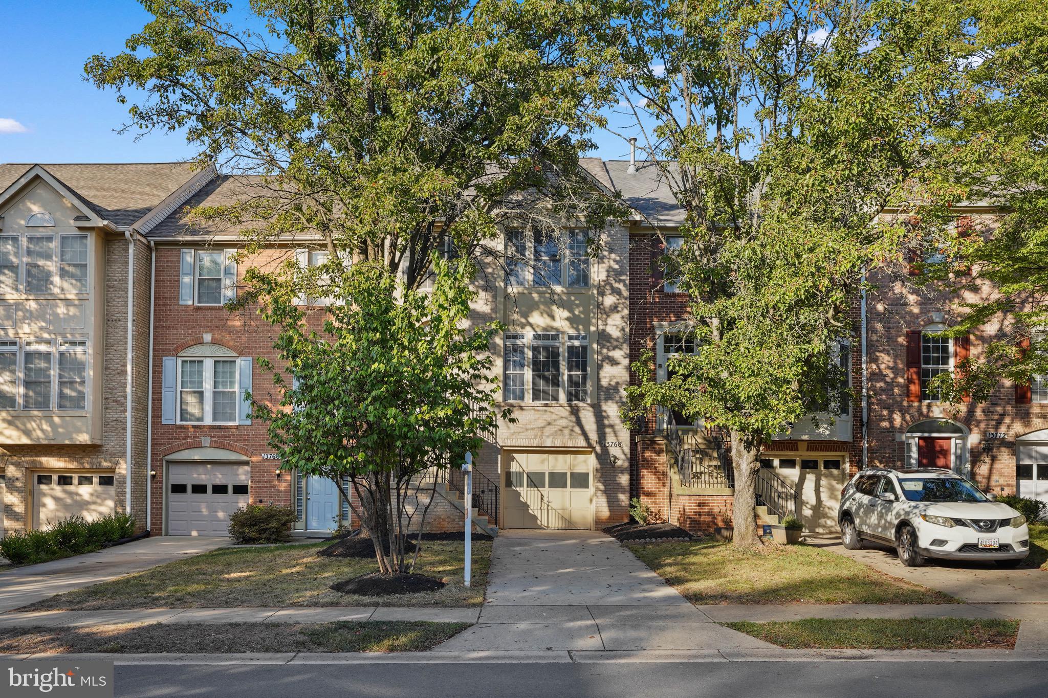 Moving ready brick-front townhouse in Willows of Potomac! 1-car garage. Newly renovated bathrooms. Hardwood floor on main level. Open kitchen with island, granite counter tops, stainless steel appliances. Large deck. Walk-out basement with large recreation room, gas FP and french door leading to patio. Brand new HVAC/furnace 2025. Roof 2018. Fresh painting throughout. Move in ready! Great Schools - Thomas Wootton HS; Robert Frost MS; Lakewood ES. Community club house, pool, play grounds & sports courts. Convenient location, minutes to multiple shopping plaza & Rockville town center. Easy access to I-270, ICC 200 & Shady Grove/Rockville Metro.