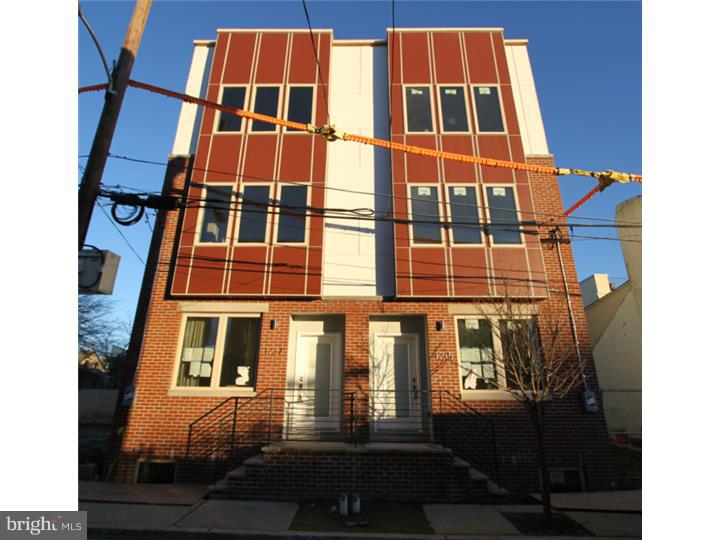 Incredible 3 story 3 bedroom 2.5 bath new construction just north of Northern Liberties. This gorgeous home has a finished basement and roof top deck as well as a 10 year TAX ABATEMENT (tax abatement APPROVED). Enter in to the open floor plan with ample space for living and dining. There are hardwood floors and recessed lights throughout including the full finished basement with powder room. The 1st floor also has a spectacular kitchen with a bar aree that seats 3-4 comfortably. Pendant lighting, quarts counters, goose neck faucet with under mount sink, stainless appliances with gas range and stainless vented hood, glass tile breadstick patterned back splash and tons of cabinetry. Access to the rear yard form the kitchen. The stairs leading to the basement and up through the home have hand forged steel handrails adding a modern industrial touch and there are open stairs leading to the 2nd floor. The 2nd floor level include 2 large bedrooms with closet space, a hall laundry room with full size from load side by side washer and dryer, and the hall bath is beautifully tiled and fitted with a soaking tub and shower combo and large storage vanity. The 3rd floor master suite includes a private stand alone soaking tub with center mount faucet, a large glass enclosed shower with pebble floor, dual vanity and custom tile work. The master closet is fitted for maximum storage and there is access to a huge panoramic roof deck from this level. We welcome your visit.