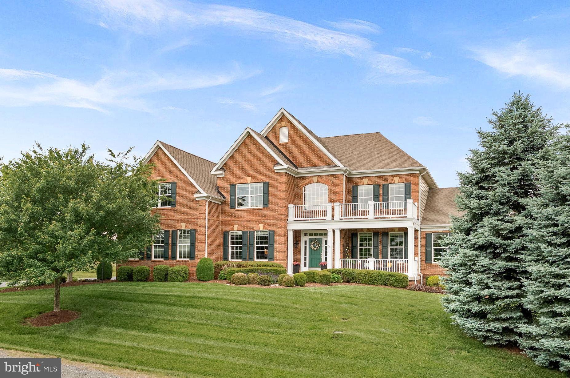 Welcome to this luxury estate home located in the sought-after Evergreen Reserve  community.  This refined residence is a testament to modern elegance, nestled on just over 1 private acre within a scenic setting and designed for luxurious living and entertainment.

Offering over 7,200 square feet of bright and airy living space across three levels, this home is an entertainer's oasis both inside and out.  This home is equipped with energy-efficient features, including a solar panel system (fully paid) that provides complete grid-independence from the local power company.  

With five spacious bedrooms and four and a half meticulously designed bathrooms, this residence offers ample room for relaxation and comfort. Hardwood floors, carpet, ceramic, and LVP flooring adorn the interiors, and a double staircase adds to the architectural charm. The primary ensuite bathroom has been recently renovated to exude luxury, featuring a standing tub, a walk-in shower, and dual vanities. Additionally, a versatile bonus room above the garage provides extra space for a variety of uses, from a playroom to a guest suite or hobby area.

The focal point of the main level is the chef's kitchen, a culinary delight equipped with top of the line appliances including a 48” dual fuel professional range with 6 burners and a griddle, a convenient pot filler, an under counter microwave, a wine fridge, and butler’s pantry/coffee bar. This open-concept space includes a large island and eat-in area, connecting to the formal dining room and family room with a natural gas fireplace, perfect for entertaining.  

Additional luxuries include a sunlit conservatory, a cozy library with built-in bookcase and storage, and a finished lower level with a wet bar, exercise area, and a state-of-the-art sound-proofed home theater with a 110-inch screen, motorized recliners, and 7.2 surround sound.   The conservatory is currently used as a home office but it can easily be converted into a main level bedroom.  Modern comforts such as a 3-zone central heating/cooling, each controlled by wi-fi enabled auto-thermostats, ensure climate control comfort throughout the seasons.  Your indoor comfort is significantly improved by the application of UV film on all windows, effectively blocking harmful UV rays and reducing the fading and sun damage to carpets and furniture.  A Tesla wall charger within the 3-car garage conveys with the property, adding to its modern conveniences.

The outdoor amenities are equally impressive, including a fully landscaped front and rear yard.  In addition, the backyard features a covered slate patio with a large stunning stone fireplace and retractable sunshades, and an outdoor kitchen ideal for alfresco dining and entertaining.  Beyond the patio, the large back lawn is ideal for a future swimming pool and/or putting green.  A 16-zone in-ground sprinkler system keeps your entire lawn and landscaping well maintained.  

Experience luxury and tranquility in a location that is both scenic and conveniently accessible, making it the perfect home for those seeking the ultimate in modern living.  Wonderful school zone with Independence High, Brambleton Middle & Sycolin Creek Elementary. Just a few miles from Brambleton Town Center, Beaverdam Reservoir, Fleetwood Winery, Hartwood Winery, Brambleton golf course and the Metro Silver Line Loudoun Station!

Seller/Listing Agent is a Virginia Licensed Realtor.  Seller would like to sell most of the furnitures.