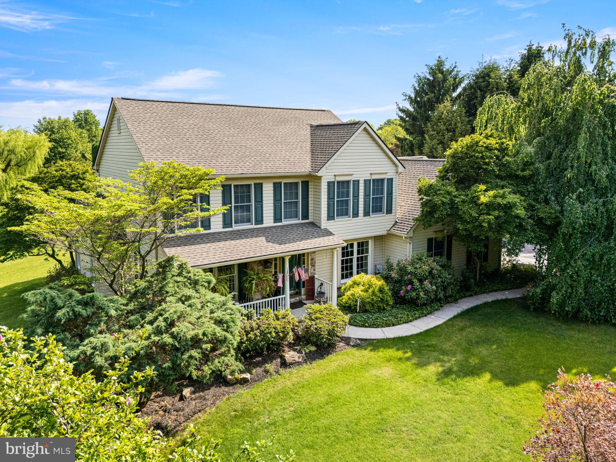 The Perfect Oasis Awaits You! 
Step into this meticulously maintained home—a true gift to the lucky buyer! Every detail has been thoughtfully updated with only the highest quality finishes. Enjoy peaceful mornings and relaxing evenings on the front and back porches, surrounded by lush greenery and a private, park-like setting.  Inside, you’ll find stunning hardwood floors throughout the first level, a beautifully updated kitchen with granite countertops, newer appliances, and stunning cabinetry, plus a cozy family room centered around a stone fireplace. The kitchen opens to a lovely back porch overlooking an expansive, shaded backyard—perfect for cooling off and entertaining.  The formal living room features a custom-built window seat and cabinetry, while the spacious dining room boasts a charming bay window and convenient access to the kitchen. Upstairs, the master suite offers a newly remodeled full bath, along with three additional bedrooms and another updated full bath.
Car enthusiasts will love the separate two-car garage with upper-level storage and workshop space. Major updates completed in 2025 include HVAC, water heater, kitchen and baths, laundry/pantry, and a new well pump.  The driveway has also been resurfaced in 2024 to add to some of the many updates.
Move right in and enjoy the care and effort put into making this house a true home. Could this be your dream home? Contact us today for a tour!