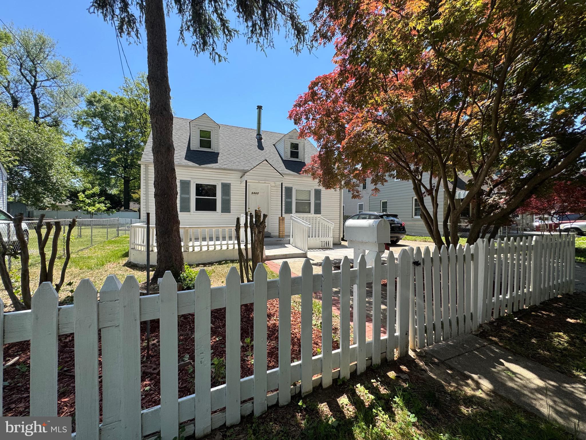 Ideally located in a quiet neighborhood, this charming Cape Cod–style home offers the perfect balance of comfort and convenience. Enjoy walking distance to shopping and public transportation, along with quick access to the BW Parkway, making commuting to Washington, D.C. just minutes away.

This well-maintained property features five bedrooms and 3.5 bathrooms, providing ample space for everyday living and entertaining. The house features a functional and versatile design, including a formal living room that creates a cozy atmosphere and a separate dining room connected to the kitchen.

Step outside to enjoy a welcoming front porch and a spacious patio perfect for relaxing or hosting gatherings. The property also includes a generous driveway and a large, fully fenced yard, providing both convenience and privacy.

Recent updates include a new roof installed in 2024 and a brand-new water heater in 2026, along with a well-maintained A/C system.

Don’t miss this opportunity to own a beautiful home in a prime location—schedule your private tour today!